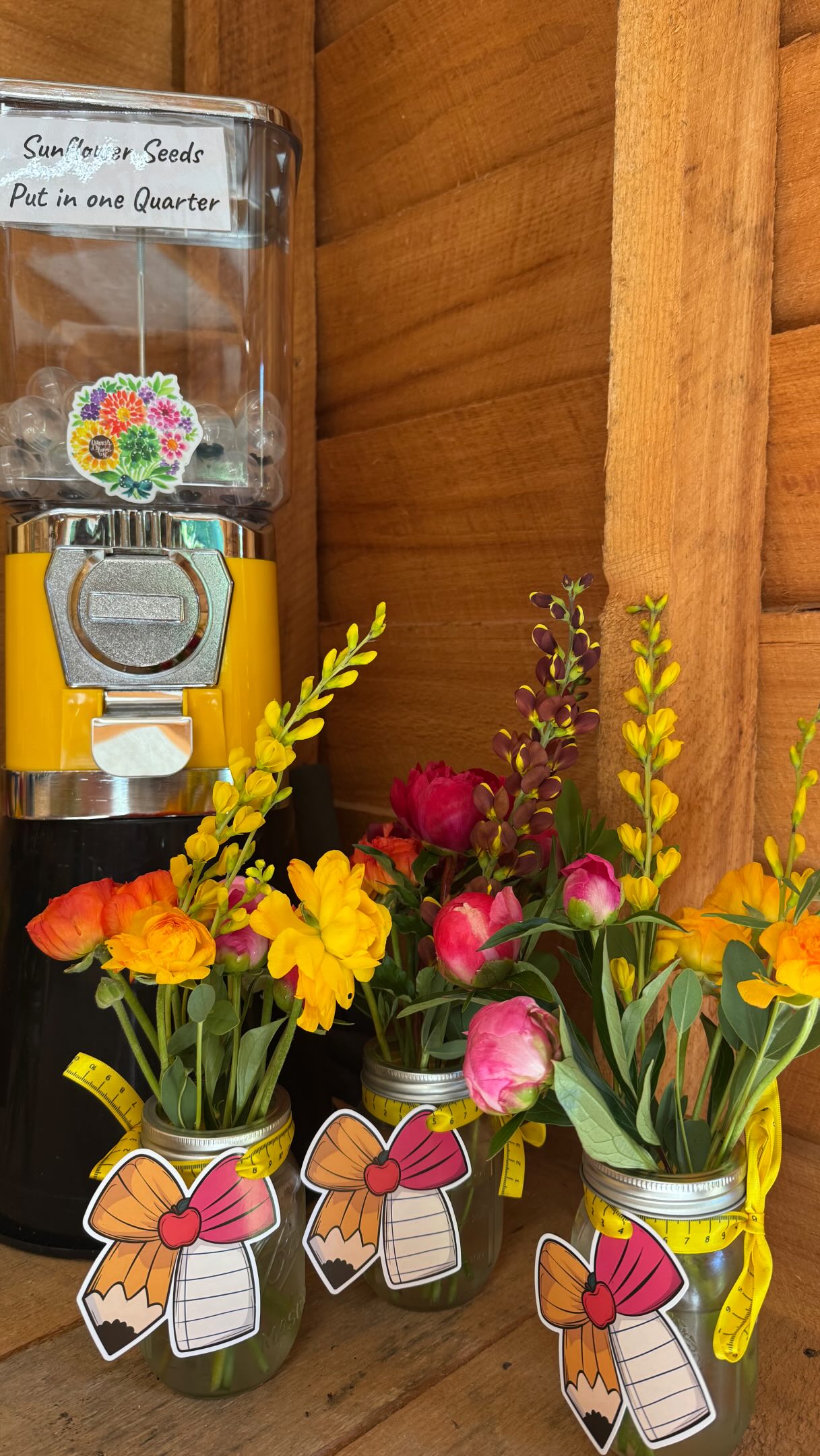 Our Seed Ball Machine is SO much fun! Simply put in a quarter and you’ll get a ball of about ten sunflower seeds ready to throw in the ground and plant!
What seeds should I put in next?
Also peep those adorable flower jars 👀 don’t forget your favorite teachers this week for teacher appreciation week! 🍎✏️🏫
The Flower Shack is open daily thru May 8, 10am-7pm
📍 345 Kimzey Rd Mills River