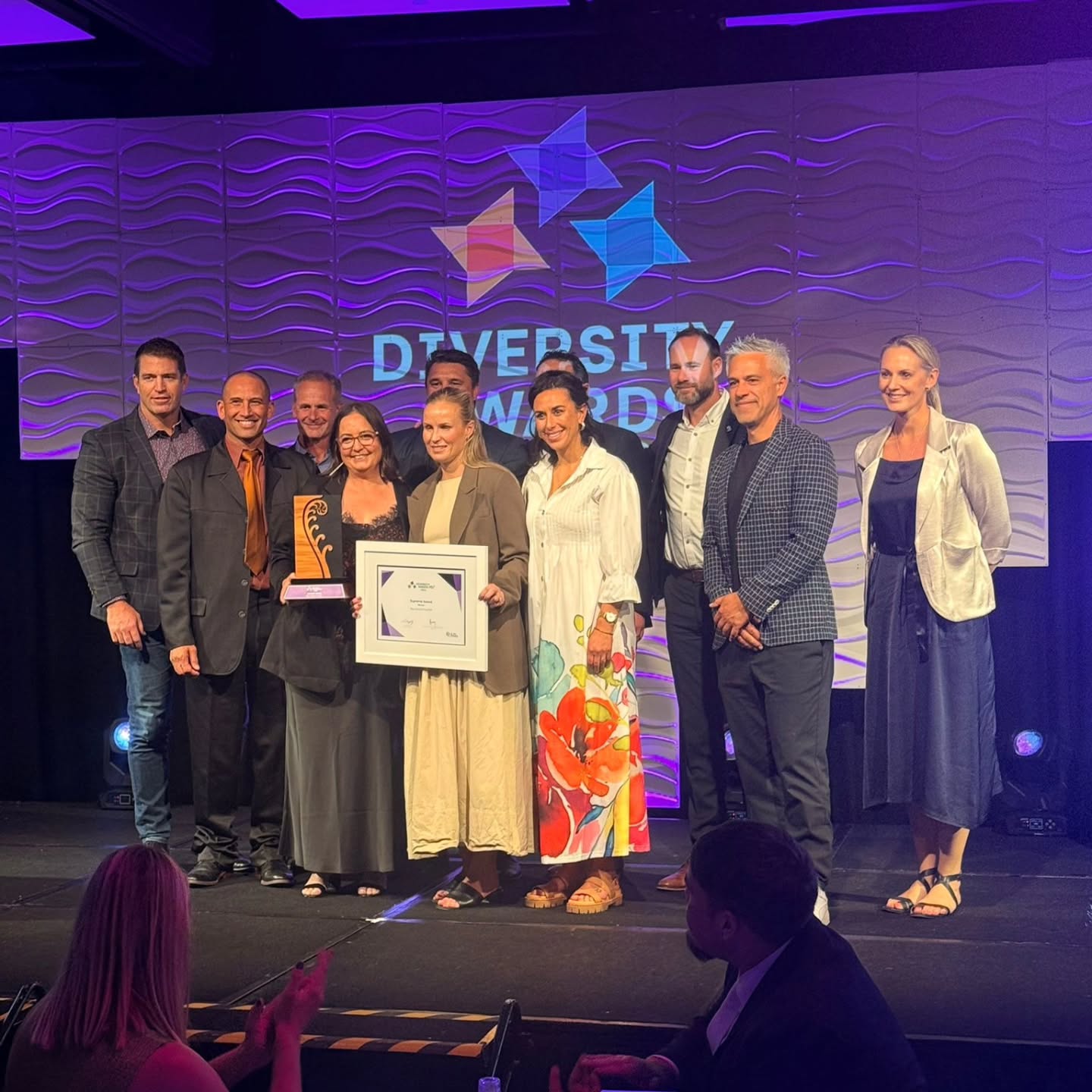 E poho kererū ana mātau o Riki Consultancy. He mihi ka tika ki a koutou o New Zealand Football.
Massive congratulations to the team at New Zealand Football on this well deserved recognition; receiving double awards at the 2026 Diversity Awards. Taking out the He Ara Māori Tohu - Cultural Competence Award and then topping the night off with the 2026 Supreme Award! We could not be prouder of you all.
Over the past few years, RCL have had the privilege of walking alongside NZ Football as they have continued to deepen their commitment to te Tiriti o Waitangi, strengthen equitable partnerships with Māori Football Aotearoa and mana whenua, and embed kaupapa Māori meaningfully across their organisation and leadership spaces.
To hear our support acknowledged publicly on stage during the award presentation was incredibly humbling for both Nathan Riki and Janelle Riki-Waaka. Our role has simply been to support and tautoko a kaupapa they have genuinely committed themselves to through te reo Māori learning journeys with staff, te Tiriti education sessions, strategic review work, cultural advisory support, and ongoing wānanga that help grow understanding, confidence, and authentic partnership.
A special acknowledgement also to Janelle, whose mahi as Cultural Advisor for the Ford Football Ferns continues to help create spaces where culture, identity, and performance can thrive together. Meaningful change happens when organisations are willing to listen, learn, reflect, and back their values with action.
NZ Football have continued to do exactly that, and this recognition is a reflection of the people across the organisation who have shown courage, openness, and commitment to doing things in an authentically Aotearoa way.
Read more here: https://lnkd.in/e9mVpMjg
“Ehara taku toa i te toa takitahi, engari he toa takitini.”
My strength is not that of mine alone, it is that of many.
Mōkori anō kia mihia koutou mō te āhua o tō koutou mahi hei whakamana i te Tiriti o Waitangi. Kāore i tua atu i a koutou.
#diversity #aotearoa #football #culture #tiriti