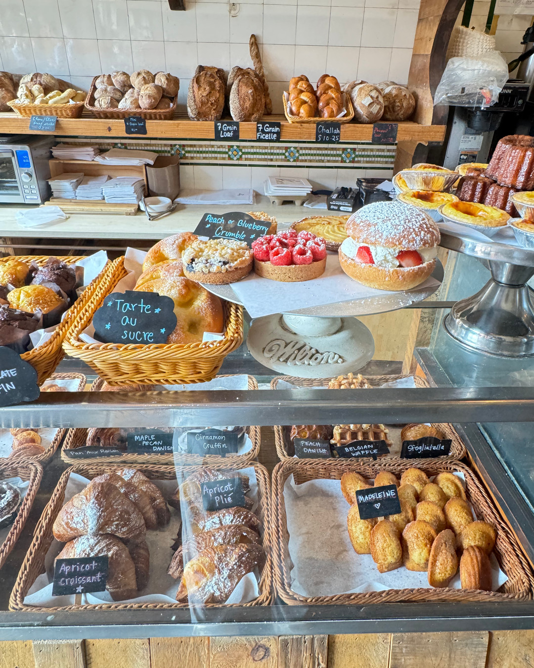Picture this: a small store front, faded French tricolors splashed above the windows. Inside is a narrow shop just off the bustling East Village street. A long counter and back wall display the most crave worthy collection of baked goods. This is Le Fournil bakery. Long a favorite of mine for amazing croissants and maple pecan danish along with large Cafe Au Lait that recall memories of my time living in Paris. Your steps take you straight to that moment—no tourist menus, just the crackle, the scent, and the story behind every bite. Follow us for insider routes, cheeky food lore, and the tastiest detours in the city. Want the map to the another less gem? Follow link in bio. 🍜🗺️🔥🥯 #NYCFoodie #EatLocalNYC #HiddenEats #FoodCulture #StreetFoodStories #EatExploreDrink42 #FoodAdventures #TasteNYC