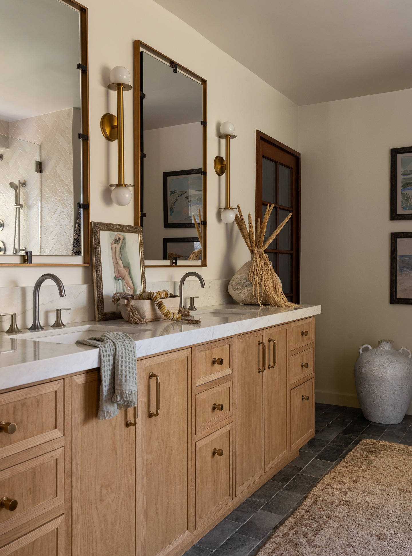 Swipe to see the before 👀
We FINALLY got to photograph this Studio City primary bathroom renovation 🤍 And I gotta say… I love this bathroom so much.
The original space just wasn’t doing this family any favors. Dark finishes, bulky tile, awkward layouts, and harsh lighting made the bathroom feel dated and purely functional, with none of the warmth or calm they were craving.
Now it feels layered, timeless, and like a true retreat. A total labor of love from start to finish ✨
Featuring custom white oak cabinetry, warm brass details, natural textures, and thoughtful materials throughout.