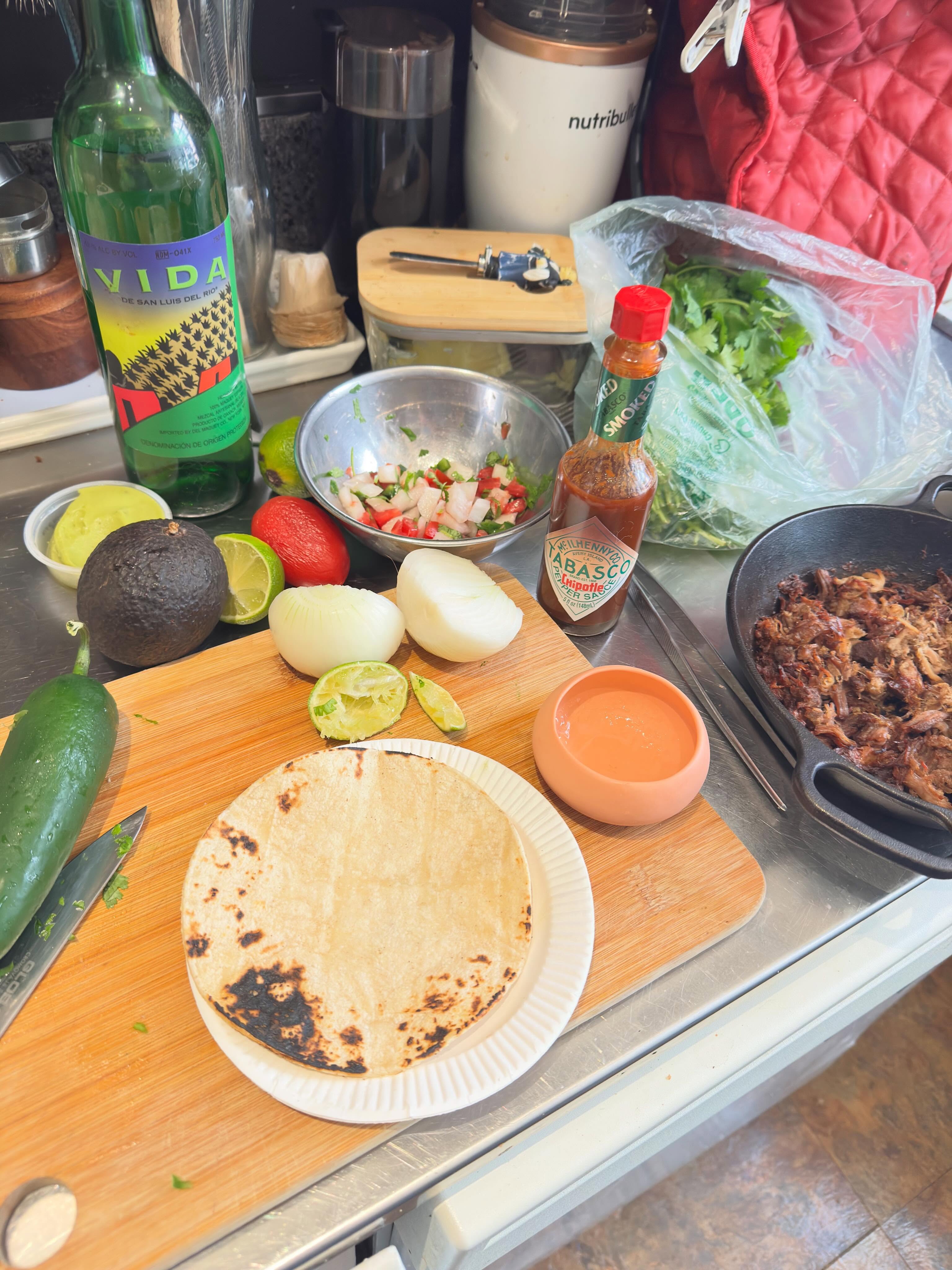 One of those afternoons, cravings and refrigerator and freezer content. Answer pork Carnitas crispy crunchy, pico de gallo, capita filled with Vida Mescal by Del Maguey. Fresh limes. #afternoonsnack #mezcal #porkcarnitas #picodegallo #delmagueymezcal