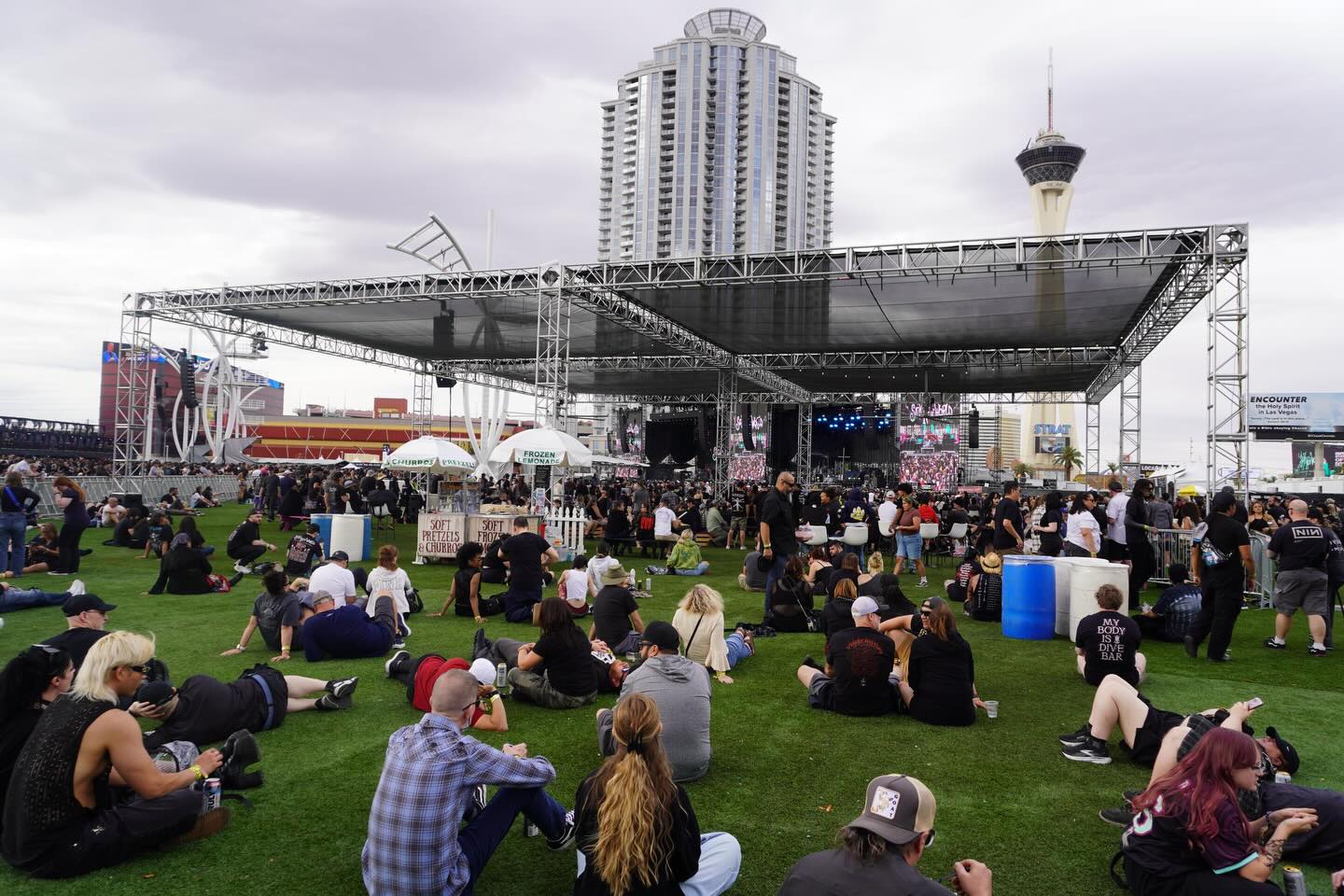 Sick New World 2026 #bandrisers #ada #signage #vip & #shade structures galore when you need to stay cool in the desert 🌤️🌦️