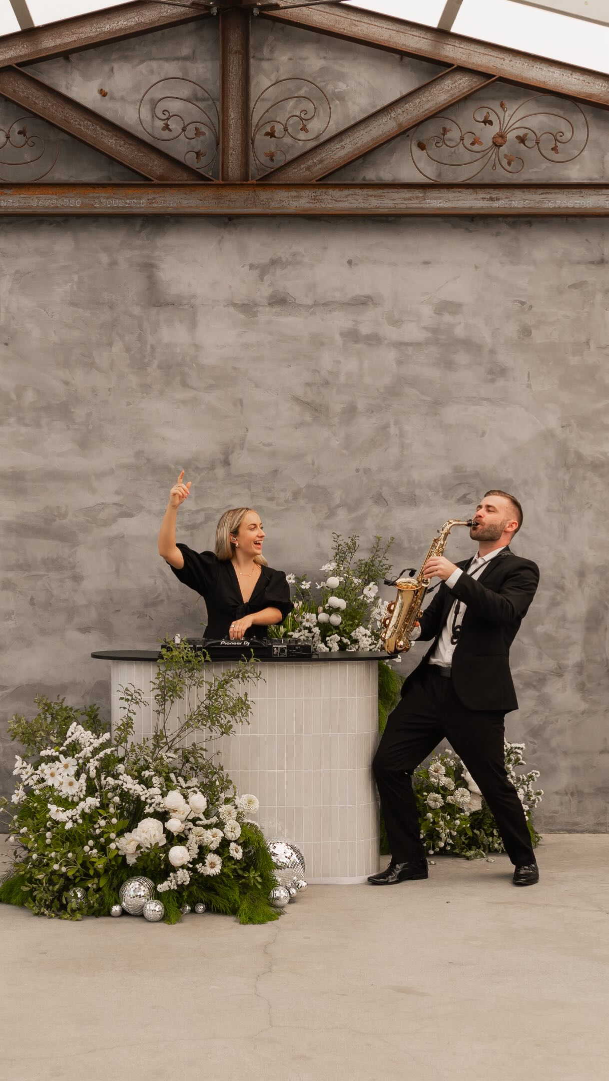 The mashup you didn’t know you needed 🎧🎷
Also hard-launching our latest luxe DJ booth; our signature bean shape table top is now available in cream tile!
Featuring our girl Phoebe on the decks and Saxy Scott doing what he does best. Check our website now to learn more about these amazing artists, link in bio!
Ready to get the dancefloor started, welcome your guests in style, or keep the crowd busy with some roving entertainment?
Let’s talk DJ BANDS ✨
.
Venue: @wynmereestate
Florals: @demavi_weddings
Video: @brodiejamesphoto
Editing/audio: @leewayrecords
#livemusic #queenslandweddings #weddingdj #luxuryevent #djsax