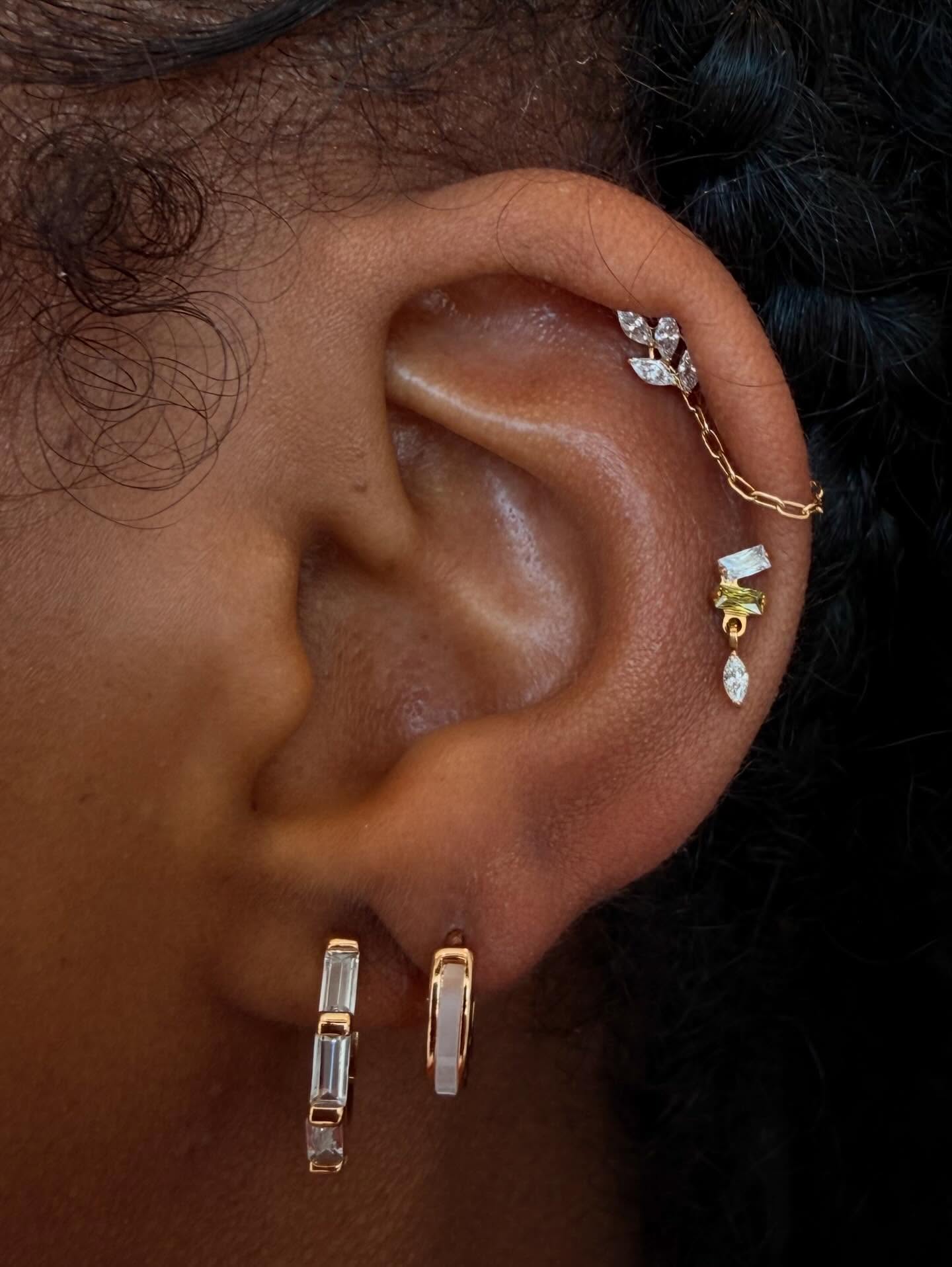 We’re pretty obsessed with this one. The custom ear chain done in house though !!!