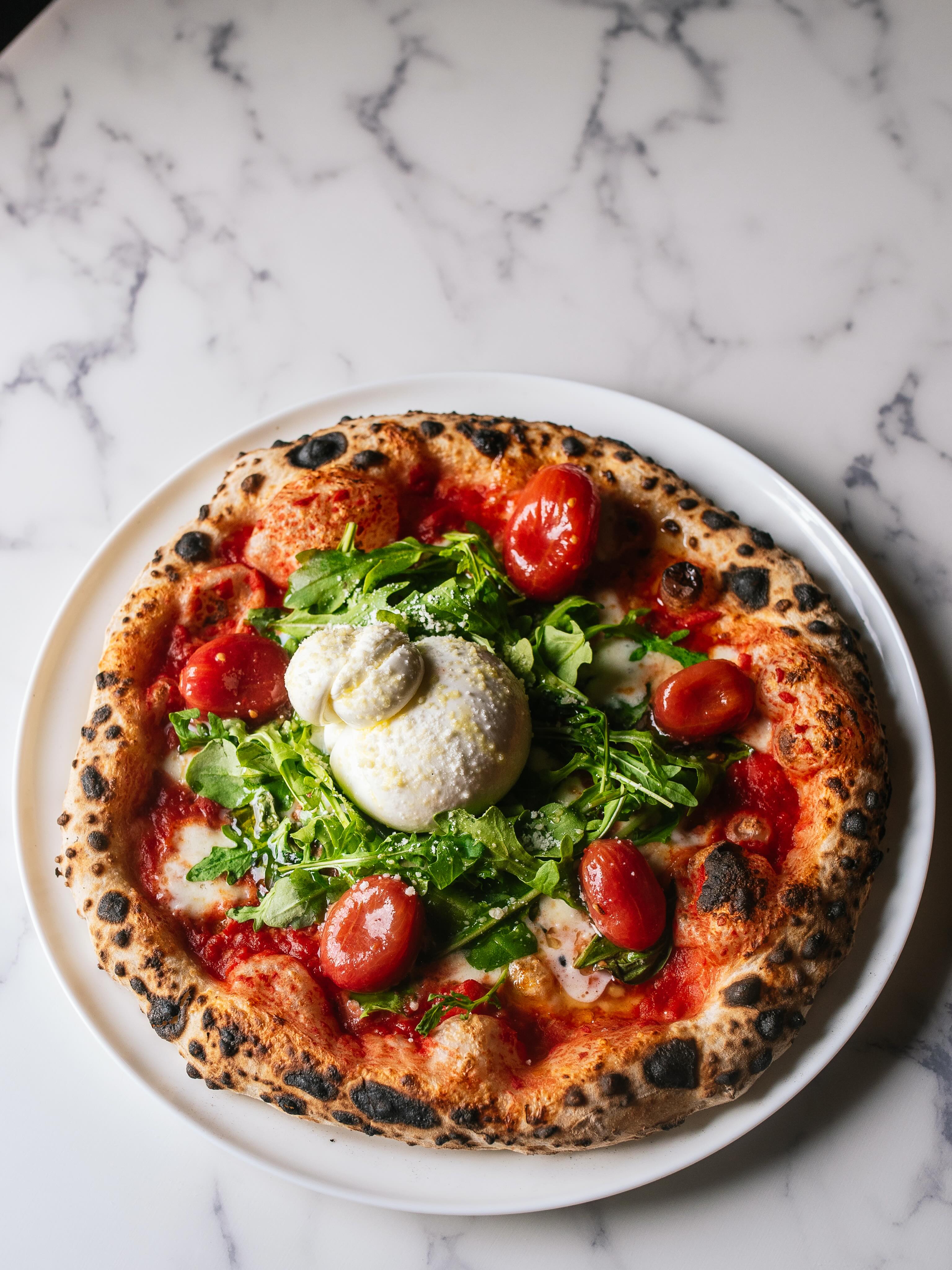 Burrata Pizza
san marzano tomato sauce, fresh mozzarella, basil, arugula, confit tomato, chilled burrata
This one is the real deal, a true celebration of Italy ☝️🇮🇹
