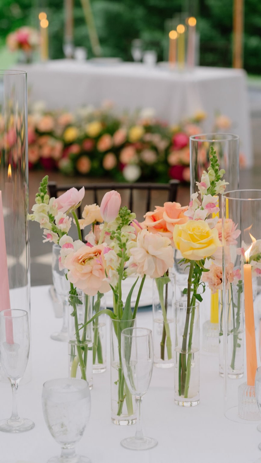 The only way to do bud vases! Full, clustered together, and surrounded by coordinating colored tapers.
The Bride: @clairerobbins13
Caterer: @theinnatvinthill
Coordinator: @etccoordinators | @handmedownsandpickmeups
Dance floor: @bookextraordinary
DJ: @zandientertainment
Florist: @thegardenhouseva
Groom: @arthur_elgh
Hair: @kimmy.huynh.artistry
Makeup: @blushtones
Officiant: @saywedowithamorcelebrant
Photography: @photographydujour
Transportation: @charterup