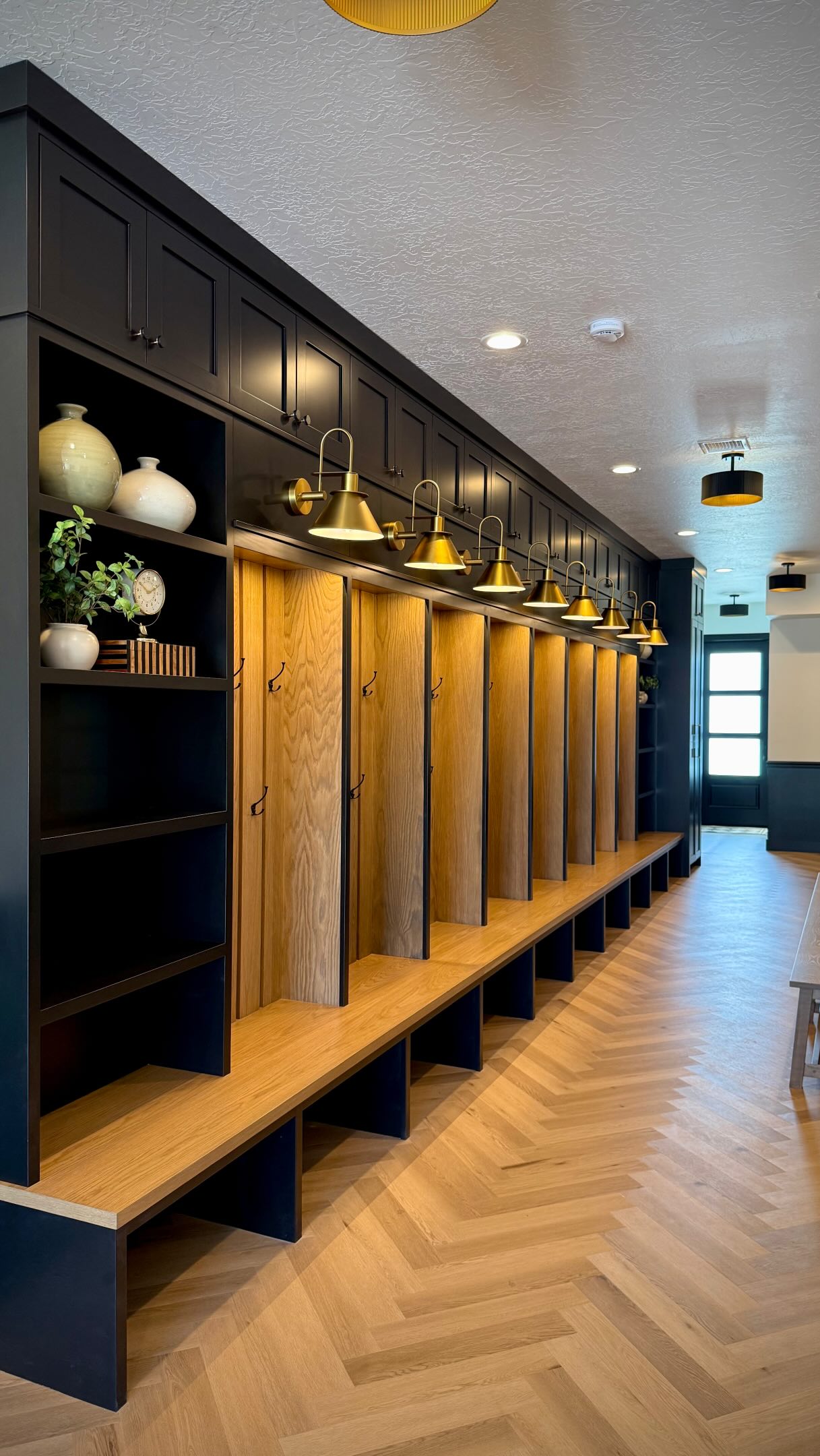 From empty in-between space… to a stunning dance studio lobby for one of my favorites @u.dance.studio
What was once an overlooked pass-through between the home and detached RV garage is now one of the most beautiful spaces in the house. We transformed it into a welcoming lobby complete with custom cabinetry, a gorgeous bathroom, layered finishes, and so much warmth and character.
I love taking spaces that don’t seem to have a purpose and turning them into something beautiful, functional, and full of life. Now every dance practice feels just a little more special.
Design is never just about making things pretty — it’s about creating spaces that make everyday moments feel elevated. #beforeandafter #lobby #dancestudio #lobbydesign #lounge