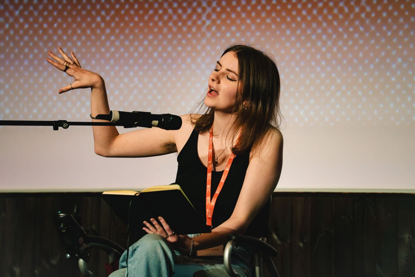 This weekend I had the incredible privilege of competing in @iamloudpro’s Paisley Slam Heat as part of @paisleybookfest 🎤 And I made the Top 3!! 🏅
I still can’t believe I got so far. I was so nervous going into the slam—and with good reason, the competition was fierce!! It was such an incredible experience and I’m so grateful to be a part of it 💛
Massive congratulations to @spencermasonslife for winning the belt!! 🏆 I know they’ll go on to do Paisley proud at the Grand Slam in Edinburgh 💪🏻
Congratulations as well to my fellow finalist @catcochrane_writer, you were incredible and it was so wonderful to finally hear your poetry in person 🫶🏻
Thank you so much to @iamloudpro for letting me take part!! I’ve also never performed with music before so it was a lot of fun hearing how @jackhinksmusic interpreted my work 🎶
📸 @jackhinksmusic @iamloudpro
P.S. How cute is little @dogtorcoco in the cast photo?? 🥺😍
#imagedescription - Georgia is a white, disabled woman. She is seen in various photos performing spoken word poetry at Paisley Town Hall. She is a wheelchair user.