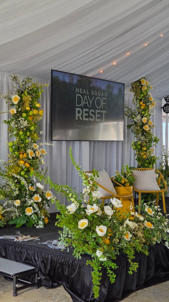 We brought a living garden to life under the tent at the Red Jacket Resort for the Heal Squad podcast Day of Reset with Maria Menounos. The goal was to make the space feel entirely fresh and garden forward.
Instead of standard, structured arrangements, we focused heavily on texture and natural movement. We styled towering branches, vibrant foxglove, fresh lemons for an unexpected citrus note, and a sea of lush peonies meticulously hand selected and specially sourced from our partners at the Floral Reserve.
When you design with living art, you are doing more than decorating a room. You are completely changing how the space feels. For a day centered around a reset, these blooms were a great reminder of what happens when you let nature and raw beauty take center stage.
A big thank you to @mariamenounos and the @healsquad team for having us.