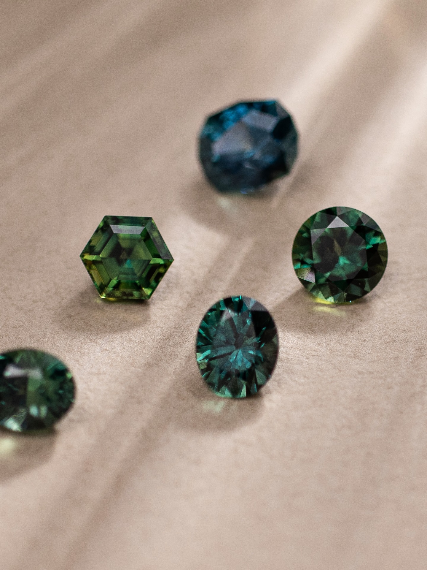 Teal Sapphires have always fascinated us with their ever-changing hues — shifting between deep ocean blue and forest green depending on the light.
At this year’s The Annual Gem Affair — Colours & Cuts, discover a curated showcase of Teal Sapphire jewellery and loose gemstones, each chosen for its unique tone, brilliance, and character. From elegant everyday pieces to one-of-a-kind stones waiting to be transformed into bespoke jewellery, experience the beauty of this increasingly sought-after gemstone.
Available exclusively at our Ann Siang Hill Boutique from 20–24 May. We invite you to discover your favourite shade of teal with us.