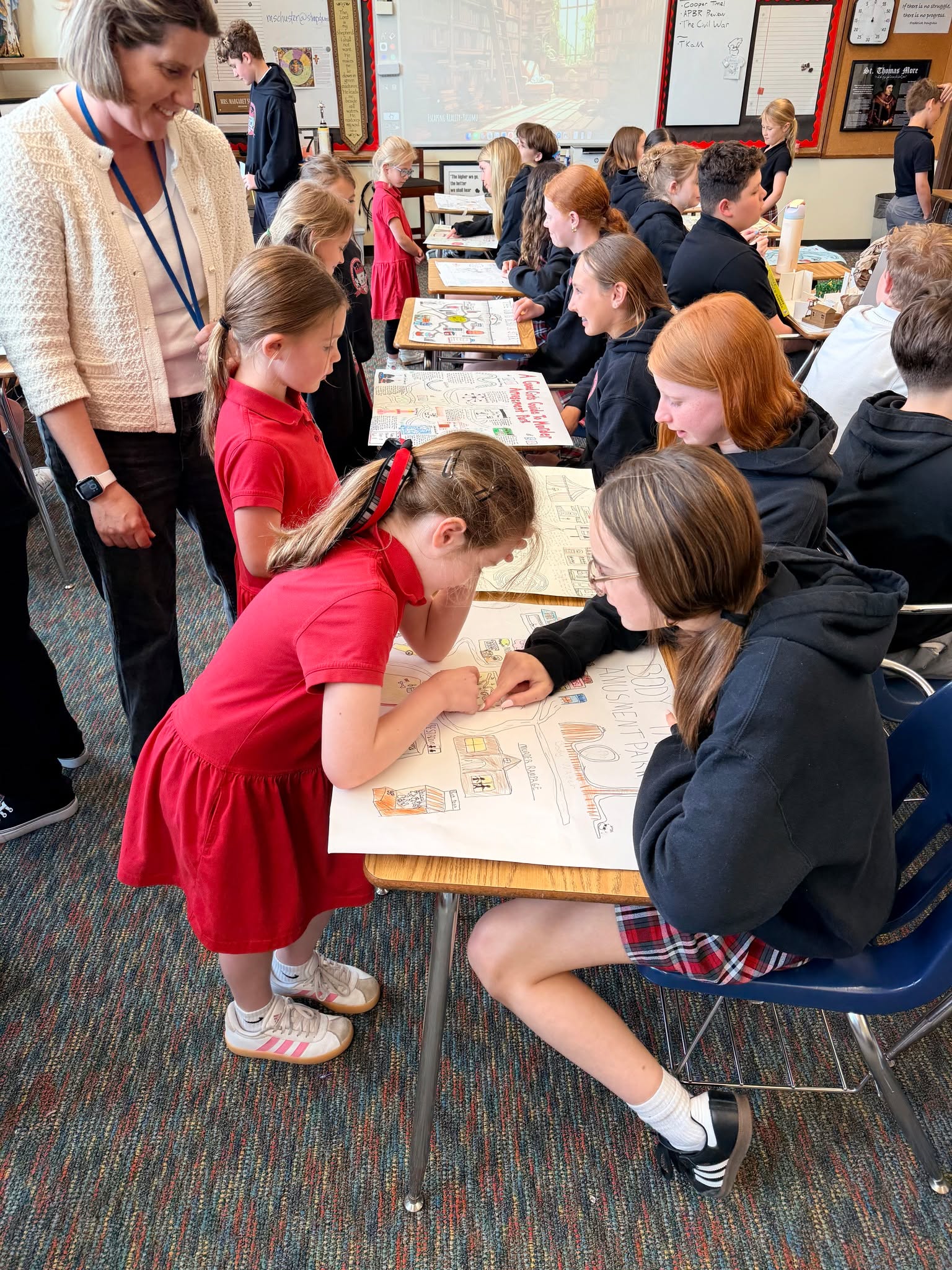 Our 7th and 8th grade students just completed an incredible Language Arts project — designing their own amusement parks inspired by the books they read! 🎢📚
From creative rides and themed attractions to detailed maps and story-based experiences, each park reflected the characters, settings, conflicts, and worlds found within their novels. Students combined literary analysis with imagination, creativity, and design skills to bring their books to life in a fun and engaging way.
Students also had the opportunity to showcase their projects to the rest of the school, and it was so much fun hearing the lively conversations and seeing the genuine interest in the books they read. Their enthusiasm and creativity were on full display!
We are so proud of the thought, effort, and originality our students poured into these projects. What an exciting way to celebrate reading!
#LanguageArts #StudentCreativity #ProjectBasedLearning #MiddleSchoolMagic #ReadingComesAlive #reading #CatholicEducation #readingfun #CatholicSchoolPortland #catholiceducation #StThomasMore #MiddleSchool #PortlandCatholic #stthomasmorecatholicschool #PrivateSchoolPortland #stmpdx #k-8 #LearningTogether #elementaryschool #SchoolLife