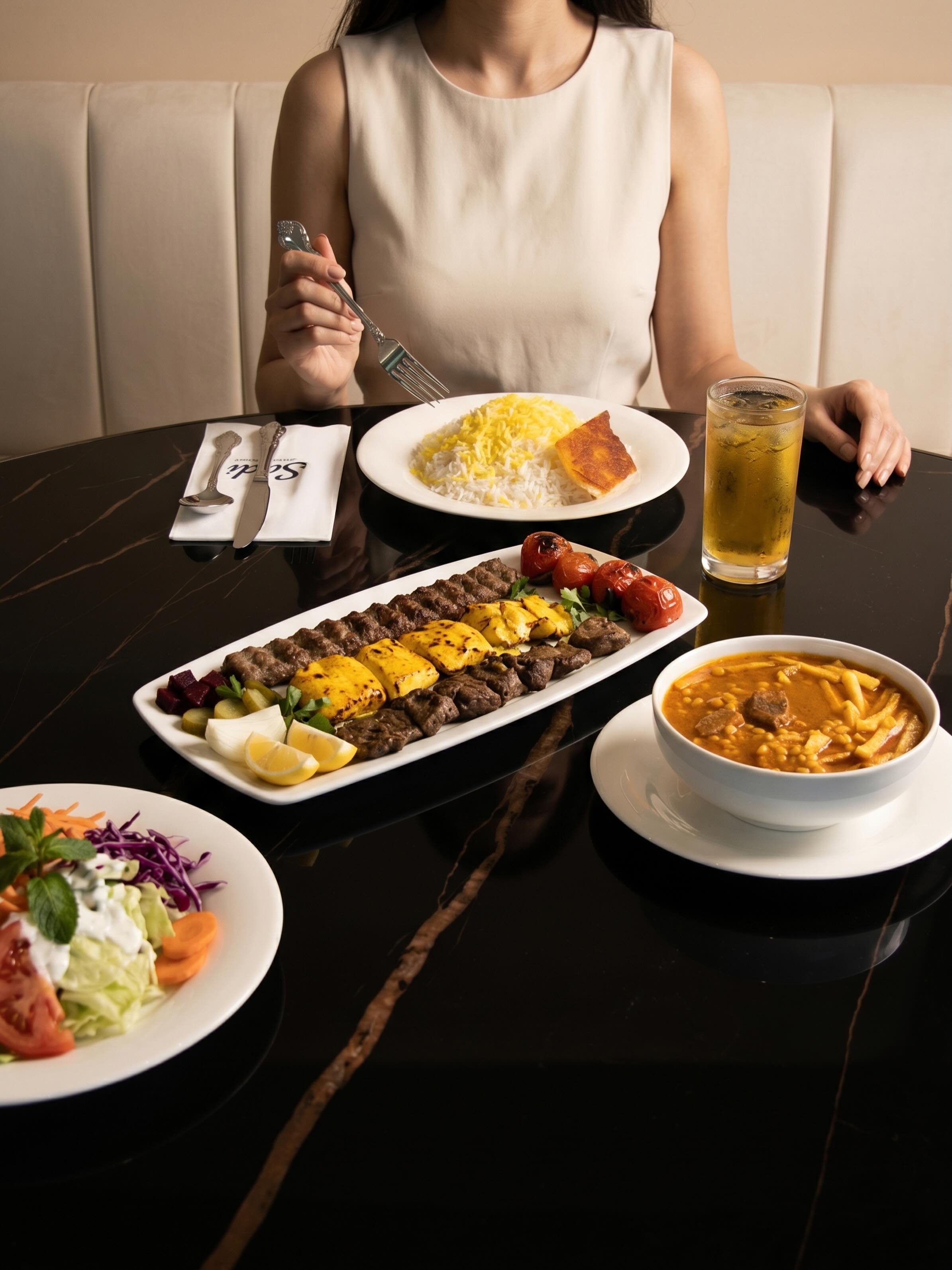 Sudi’de sofranın yıldızı bugün kebaplarımız.
Safranlı pilav, geleneksel İran yemekleri ve sıcak bir restoran atmosferiyle sizi Ataşehir’de bekliyoruz.
İran mutfağını sevenler için lezzet dolu bir masa hazır.
Rezervasyon ve sipariş için bize ulaşabilirsiniz.
📍 Atatürk Mah., Atapark Cd., Trendist Dükkan No:3/PA, Ataşehir / İstanbul
☎️ +90 216 266 6036
#SudiRestoran #İranMutfağı #AtaşehirRestoran #İstanbuldaKebap #PersianFood