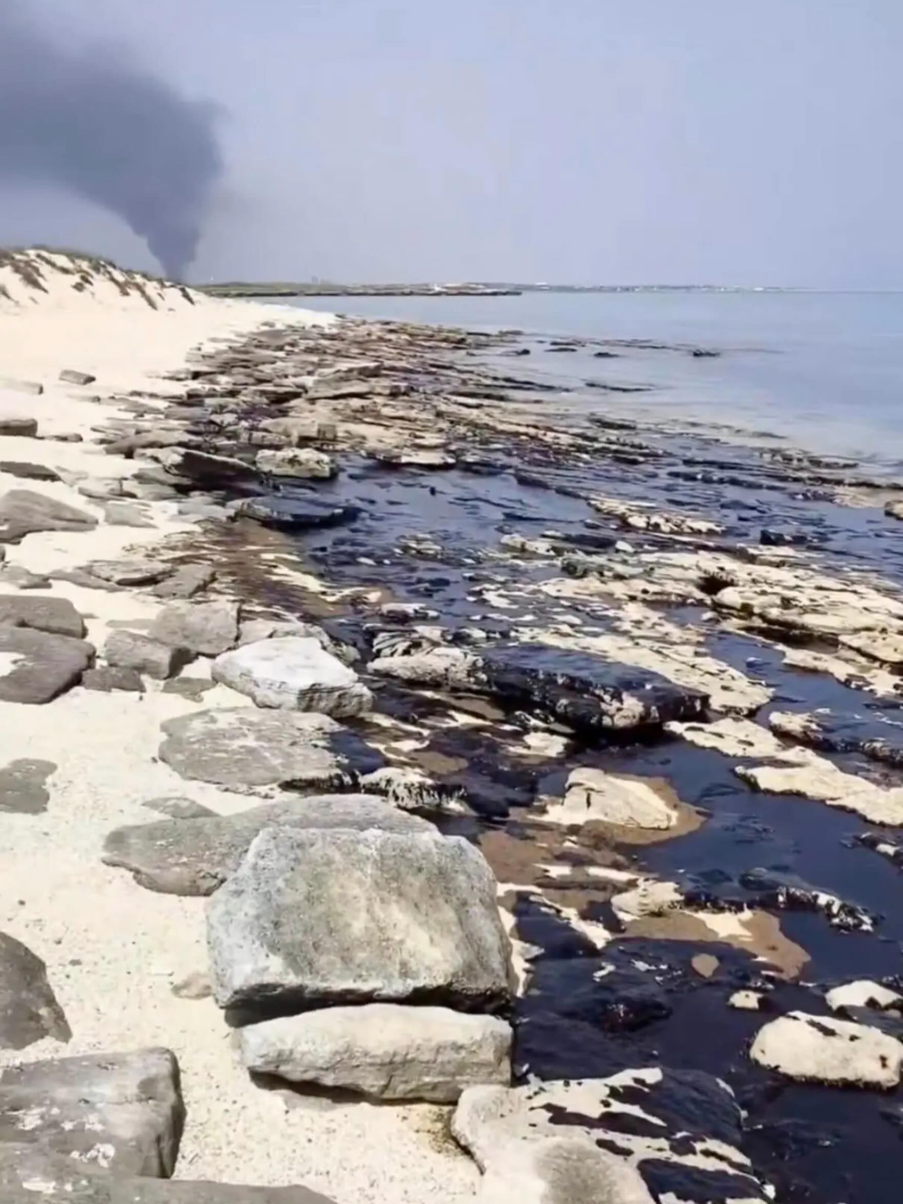An oil spill has reached the shores of a pristine Persian Gulf island in Iran surrounded by clear turquoise waters that provide refuge for endangered sea turtles and dolphins, according to videos circulating on social media.
The tiny, uninhabited island of Shidvar is one of Iran’s most important protected nature reserves. It is home to large coral reefs and a breeding ground for more than 80,000 birds.
The videos, verified by The New York Times, show large dark ribbons of oil snaking along the island’s pristine white sand beaches. Birds, turtles and crabs can be seen trapped inside mounds of tar.
“It is known as the Maldives of Iran — a beautiful place,” said Kaveh Madani, director of the U.N. University Institute for Water, Environment, and Health.