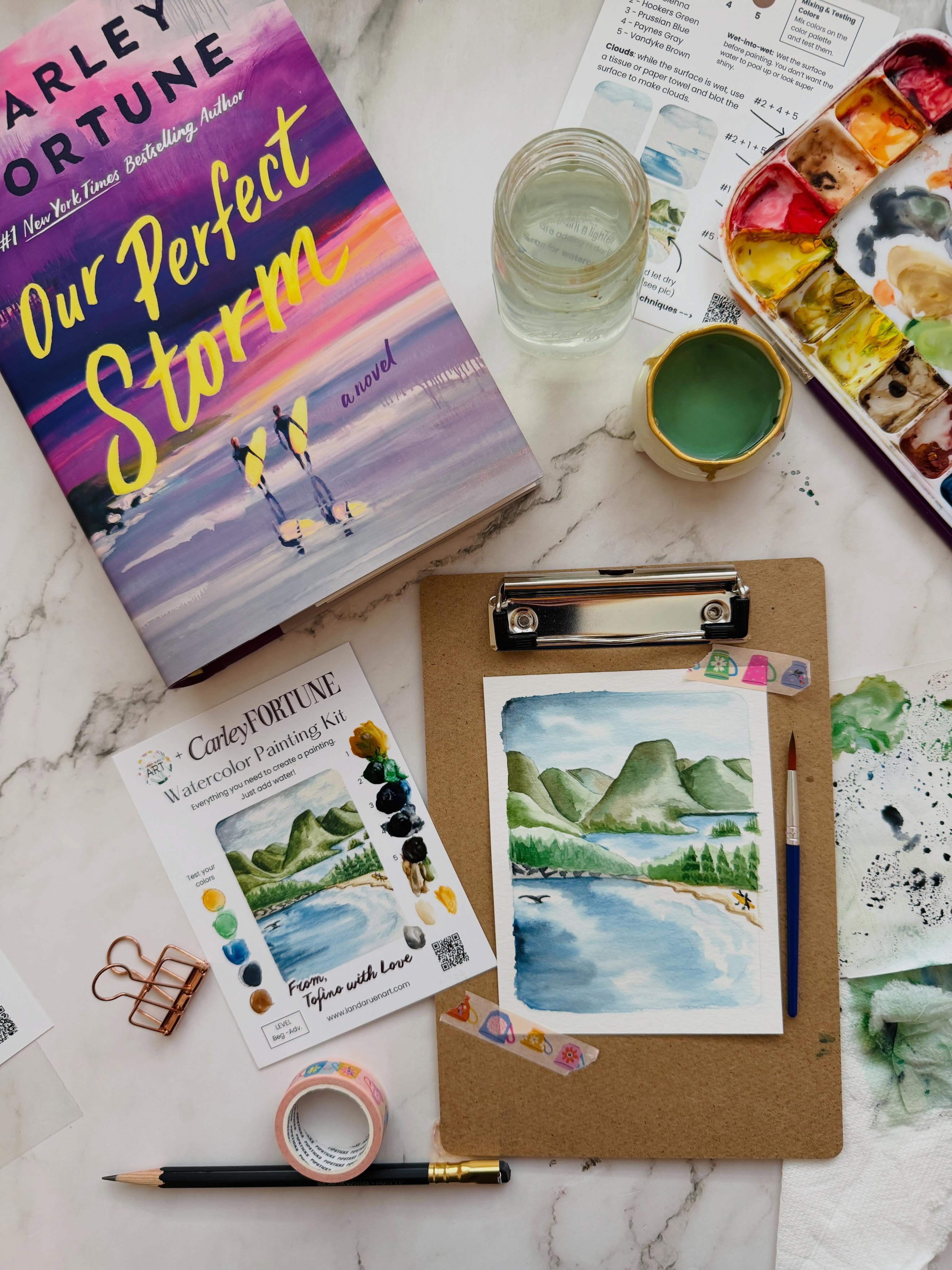 I recently had the amazing opportunity to create another custom kit for the talented @carleyfortune for the launch of her new book 🌊💜 Our Perfect Storm. 💜🌊
I painted the beautiful and lush setting for the book, Tofino. Before working on the kit I hadn’t heard of it but now it’s on my travel wish list!! The pictures are absolutely GORGEOUS!
It reminds me a bit of the karst mountains of Yangshuo, China (fun fact: I got to visit Yangshuo back when I lived in China.)
If you want to snag one of these special watercolor kits head to Carley’s merch shop. 🎨🛍️ AND definitely check out her books, they are soooo good and perfect for winding down and relaxing.
Can’t wait for you all to discover her books and the new custom kit! 💜💜💜💜💜
#landaruenartshop #watercolorkits #carleyfortune #tofino #ourperfectstorm
