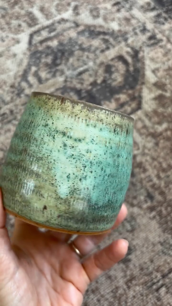 That thing where it pools and morphs into all these beautiful colors. There’s something about this glaze breaking from the rim and around all the little etched carvings that I can’t stop staring at. It’s always such a surprise as you never know what you’re going to get in a reduction firing. But this is the kind of firing that makes all the unpredictable ones worth it.
#functionalart #favoritemug #thumbcup #ceramiccup #musthaveit