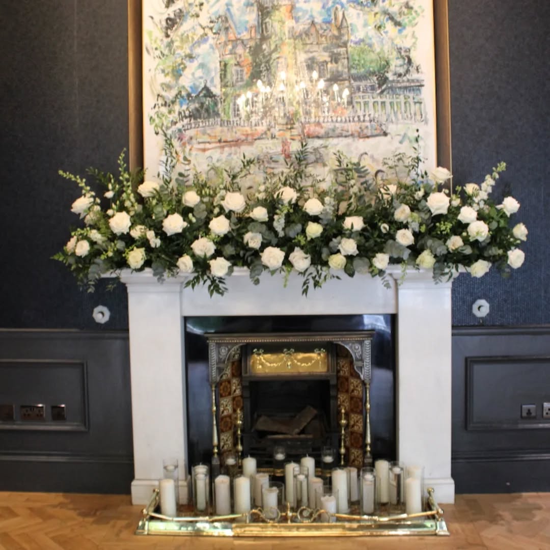 Congratulations to R&P who were married at beautiful Carlowrie Castle this afternoon. I've wanted to decorate this gorgeous mantelpiece for as long as I can remember.#playablancaroses #weddingfloristedinburgh #weddingflowersedinburgh ,#mantledecot #mantlevandles