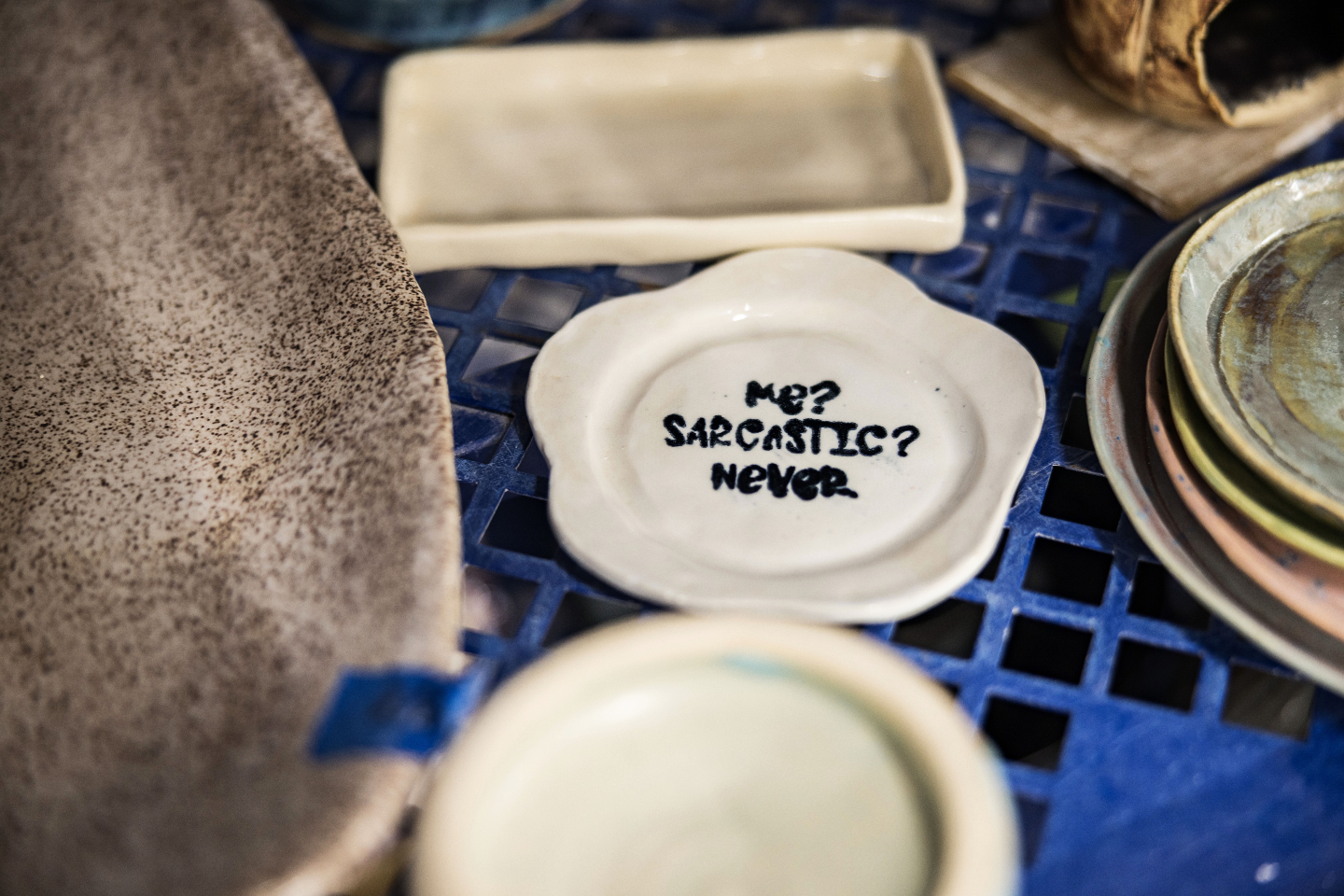 Some people make elegant serving trays.
Some people make perfectly glazed bowls.
And some people make tiny dishes that say exactly what everyone at the studio was already thinking š
Honestly, pottery people might be some of the funniest people around. The shelves stay stocked with good work and questionable sarcasm.