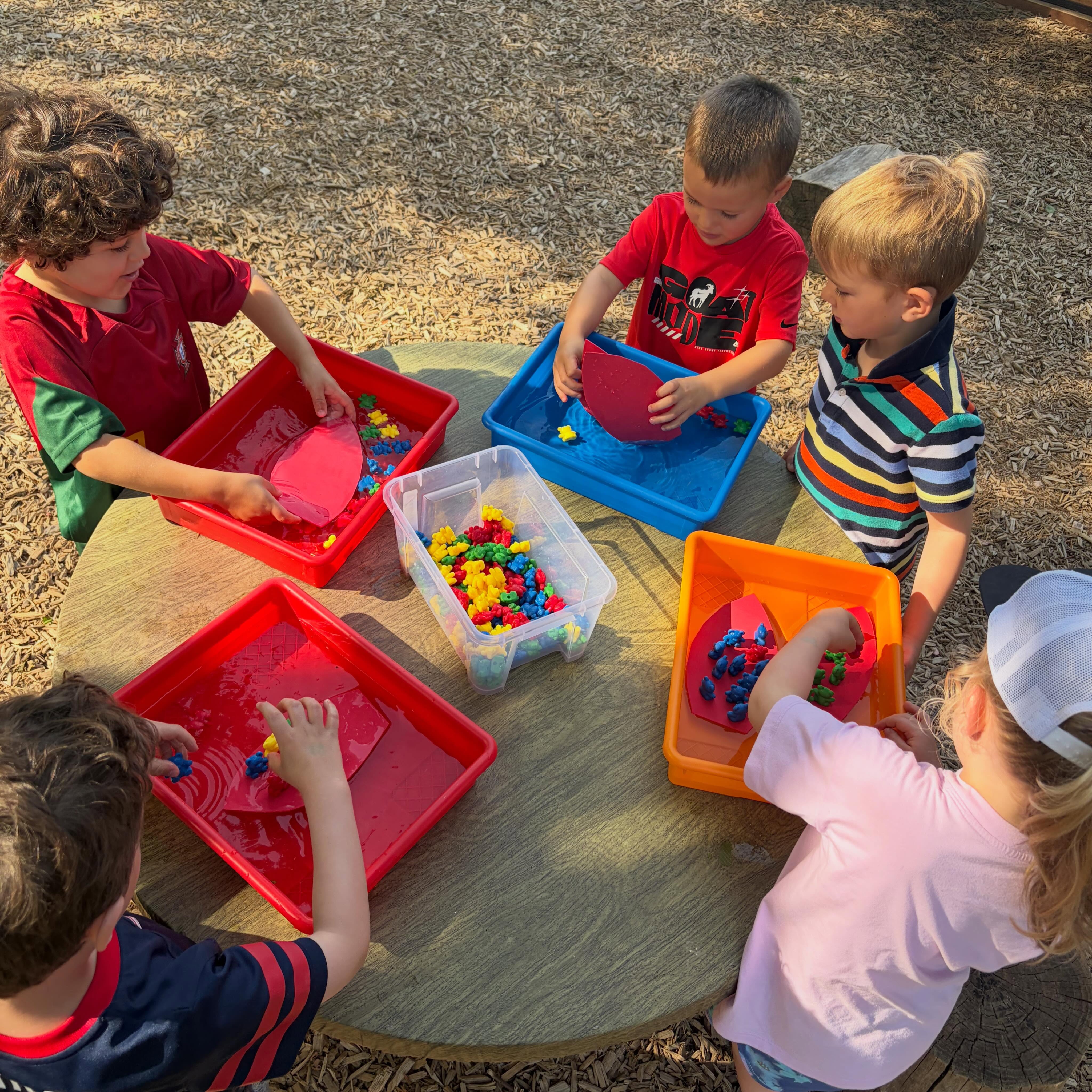 STEM on the playground….how many bears can float on the boat?!?