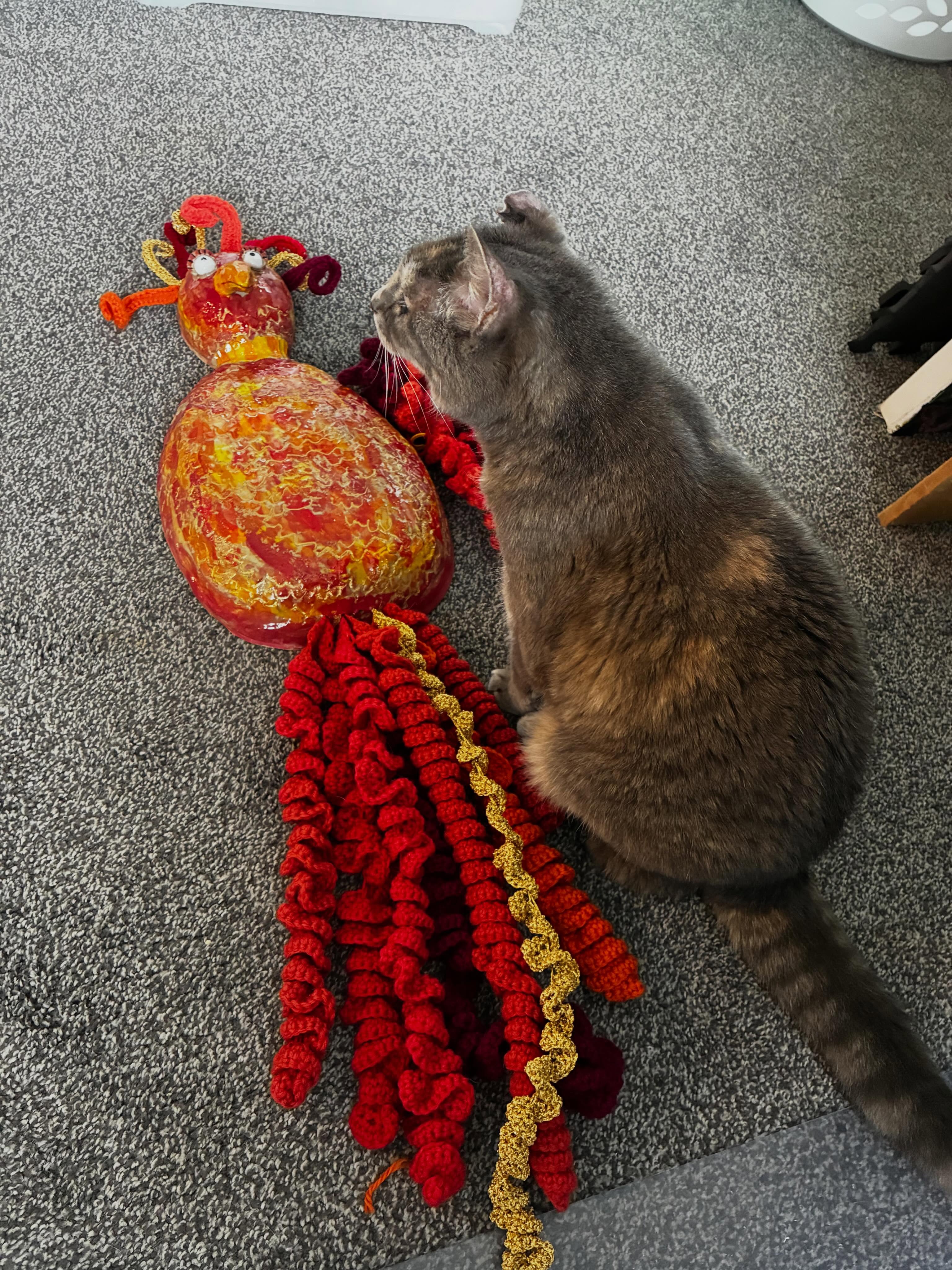 Sienna the cat having a chat with the phoenix being prepared for my exhibition and @migrainefoundationaotearoanz fundraiser starting on June 2. #migrainewarrior #painandart #soloexhibition #phoenixrising