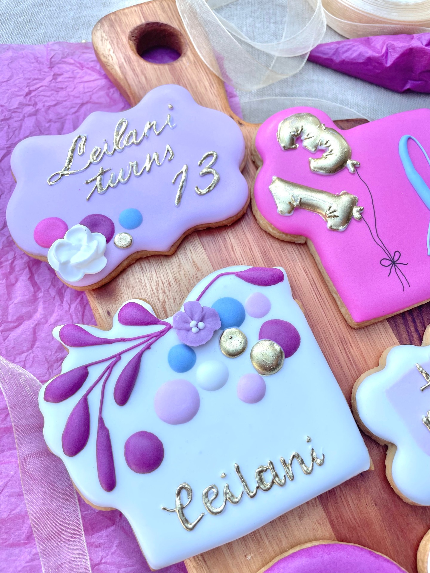 Pink and pretty and a bit extravagant! 13th birthday cookies for someone celebrating becoming a teenager.
