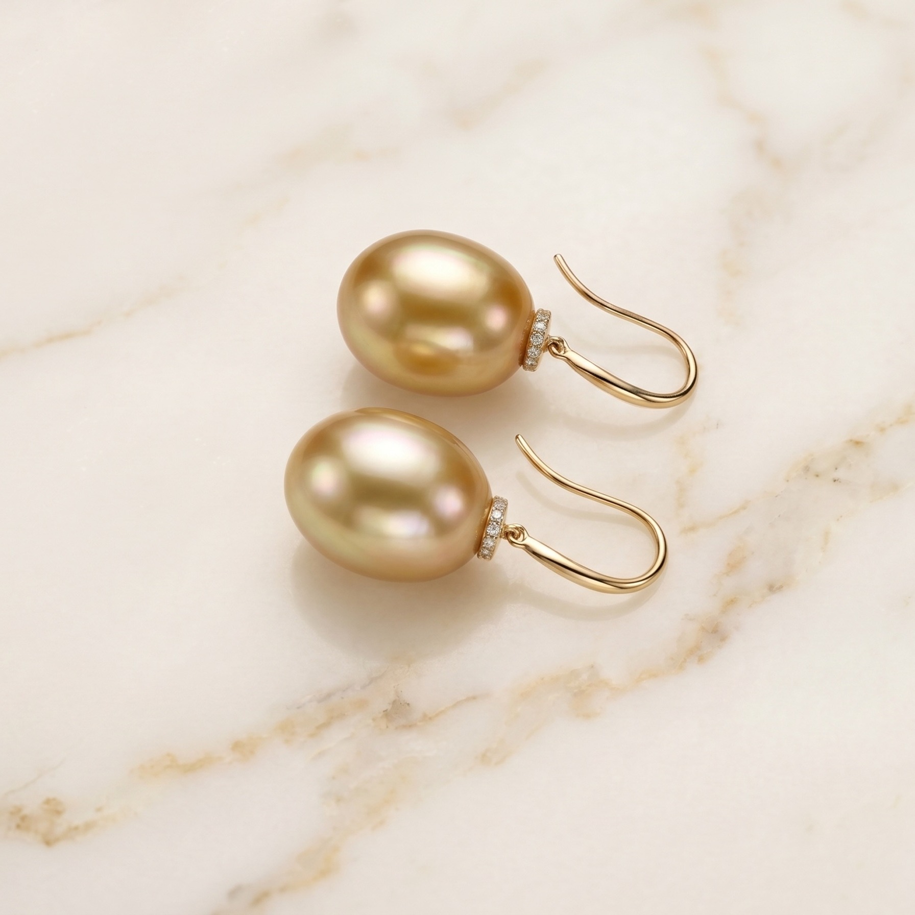Pearlure Earrings
Golden South Sea Pearl Earring
11mm OV+1 / 2 Gold
18K Gold and Diamonds Setting
Visit or contact your nearest boutique to discover more about our exquisite collection.
The pearls can be substituted with Australian South Sea Pearls upon request.