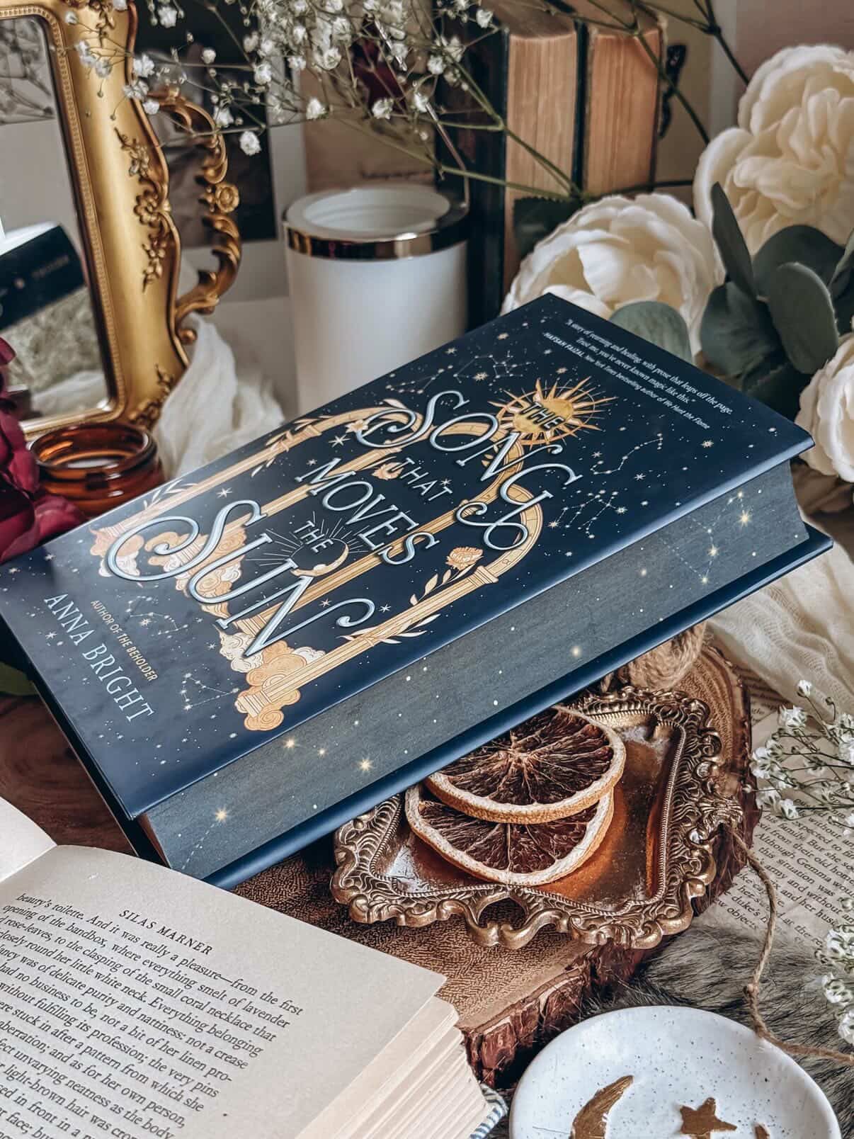 Excited to feature this beautiful EVENT EDITION of “The Song That Moves The Sun” by Anna Bright
Edges on this beauty were designed and printed by @bookish_signs and if you missed the pre order window there will be extras stocked at the on site book store for personalization and signature from the author on site!
📸 @thebookscript
🎫 $15
📍 @embassysuiteshuntvalley
📅 7/25/26
SYNOPSIS
This sweeping YA fantasy romance full of star-crossed love, complex female friendship, and astrological magic is perfect for fans of Laini Taylor, Alexandra Bracken, and V.E. Schwab. From the acclaimed author of The Beholder.
Best friends Rora and Claudia have never felt more like their lives are spiraling out of control. And when they meet Major and Amir—two boys from one of the secret cities of the spheres, ruled by the magic of the astrological signs—they discover they’re not alone. There is a disruption in the harmony between the spheres, and its chaos is spreading.
To find the source of the disharmony, Rora and Claudia will embark on a whirlwind journey of secrets, romance, and powerful truths—about themselves, each other, and two long-ago explorers named Dante and Beatrice, who were among the first to chart this course toward the stars.
Inspired partly by the classic works of Dante Alighieri, this gorgeous stand-alone contemporary fantasy will captivate readers of Lore and Star Daughter.
#romantasy #ritv26 #specialedition #bookcon #booksigning
