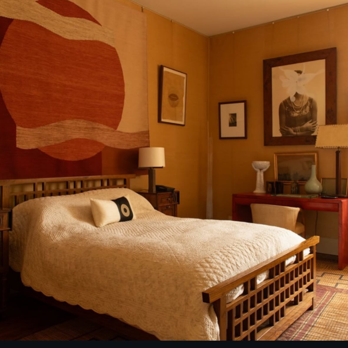 Beautiful photo by @genevievelutkin of a bedroom at Houghton in the ‘modern wing’ , showing @sussycazalet ‘s wonderful wall tapestry, commissioned specifically for the space. On the wall above desk is a painting by @grillo_demo using a photographic portrait of David