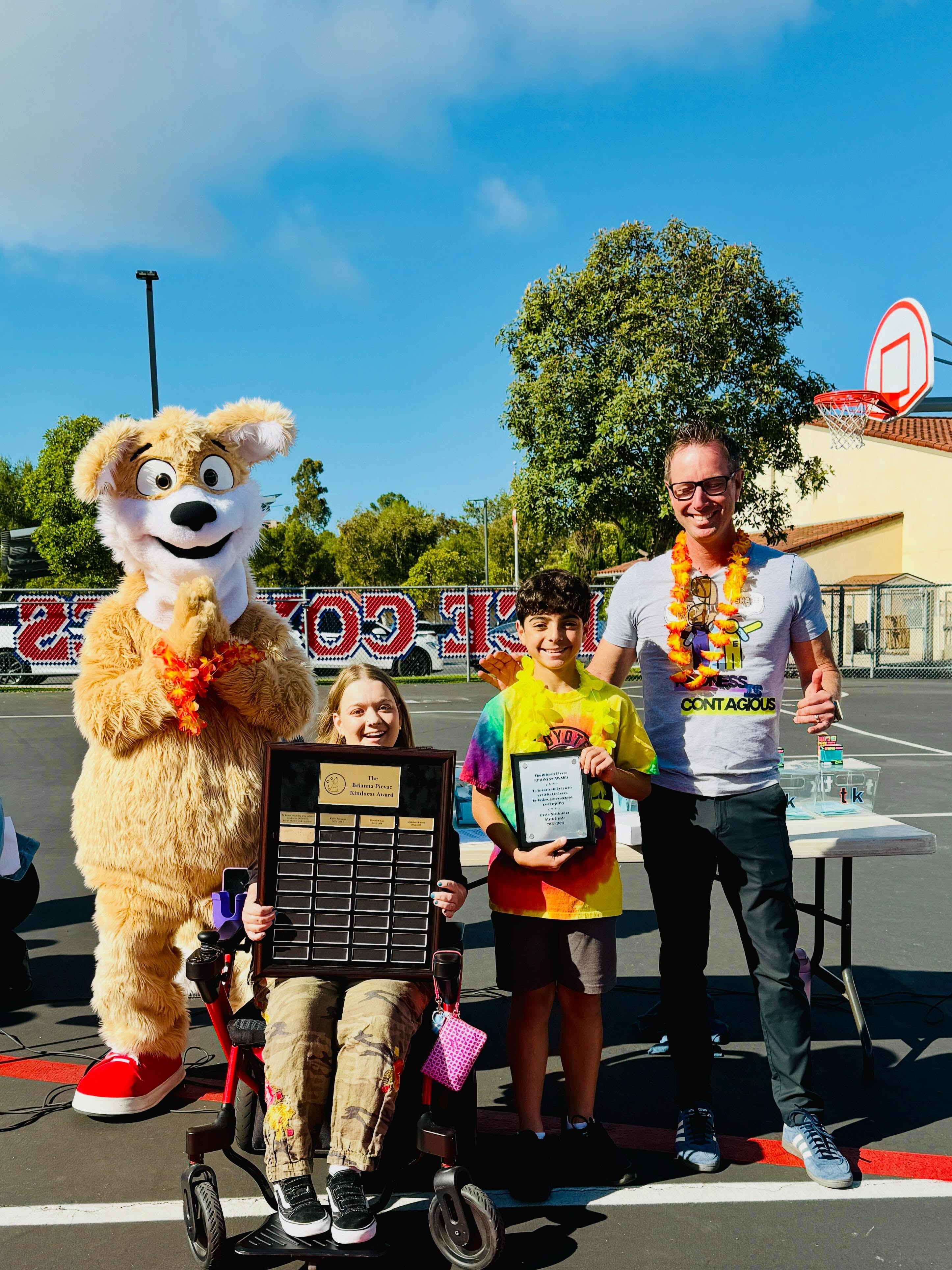 One of the most meaningful traditions at Newport Coast Elementary is celebrating kindness. On Friday, NCE had the honor of celebrating kindness in its purest form.
Congratulations to Gavin Balabanian, recipient of the 2026 Brianna Pievac Kindness Award! This special award recognizes a student who consistently leads with compassion, empathy, inclusion, and a caring heart—qualities that make our school community stronger every day.
A heartfelt thank you to Brianna Pievac for joining us once again to present this award. Brianna continues to inspire our students through her example of perseverance, positivity, and kindness, reminding us all that even the smallest acts of kindness can make a lasting impact.
Congratulations, Gavin! We are so proud of the kindness you share with others and the difference you make at Newport Coast Elementary. 💙✨