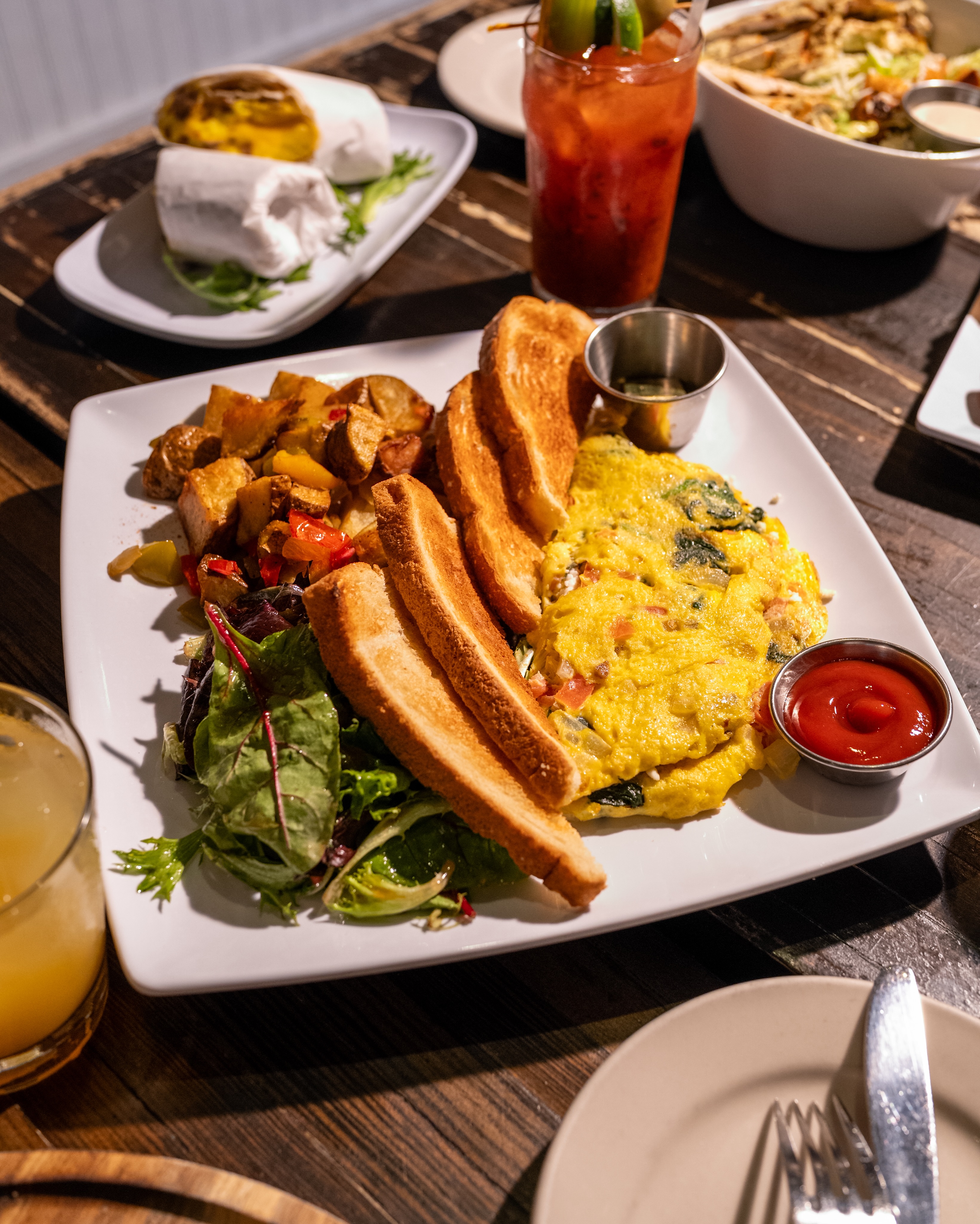 The Omelette of the Day is doing the most — served with home fries, mesclun greens, and toast. Brunch weekends 11-4. Come through, we’re on Ditmars.