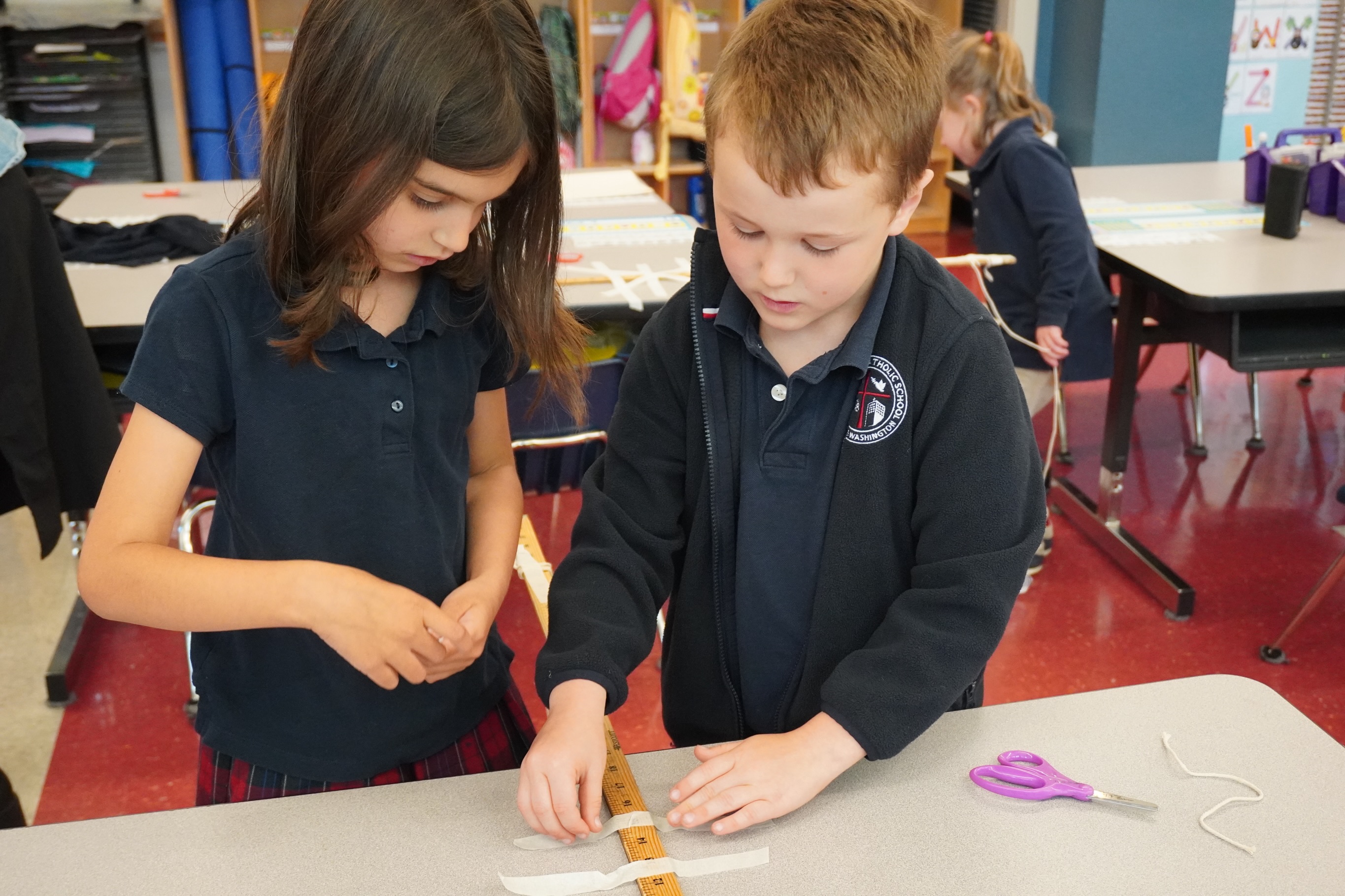 In this week’s lesson, students change the strength and direction of a wrecking ball’s push in order to solve a tricky problem. The activity, “Don’t Crash That House” is a game in which students experimented with the force of a paper wrecking ball in order to knock down a wall of cups without knocking down the surrounding neighboring paper houses. #stemlab #kindergarten #kindergardener #seattlecatholicschools