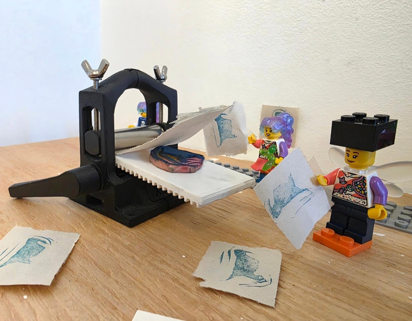 Have you ever wanted to make a Lego print with your favourite person? Now is your chance! Register on our website (link in bio).
Tag Team: Father's Day Lego Cards
Sunday June 14th 2026, 10 to 12pm
Instructor: Amye St John
TAG TEAM is a series of one-day family-friendly workshops at inPrint, where you create a work of art side by side with your loved ones! Workshop registration is done in pairs for an adult + child (max two total participants per registration).
Play with Legos the inPrint way! Join us for a special edition of TAG TEAM celebrating Father's Day!
A blend of pixel art and printmaking, you will be shown how to make an image with play bricks (Legos) as well as how to print and register your paper. Turn your favourite building toys into an image block for a fabulous, accessible and creative style of printmaking. You will be creating and designing your own image or message to print in multiples on fun paper to create a Father's Day card. Don't forget to wear your shoes - no one likes to step on a Lego play brick!
Great as a Father's Day experience OR come with your bestie to make a card for the parental figure in your life!
All materials are included with class fee. Recommended for ages 6 and up. Adults must accompany children. One registration = 1 adult + 1 child
ID 1- photo of a tiny printing press, with 2 Lego minifigures making relief prints
ID 2- Photo of a table at inPrint Studio, showing a figure made from Lego tiles with red ink rolled into it, and a brayer.
#toronroprintstudio #torontoartclasses #legoprint #parentandchildclass #Lego