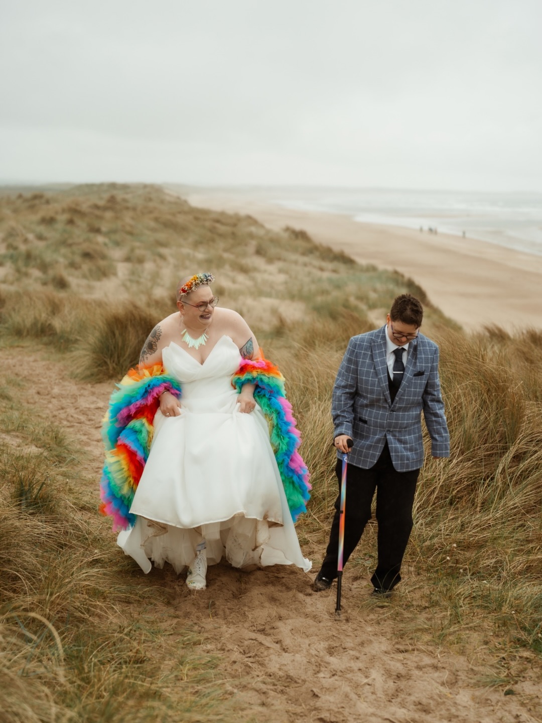 Lucy & Leanne 🏳️🌈
What a day!!! Rugged Northumberland coastline popping with colour in a celebration of pride. Lucy & Leanne had followed us for years and even before they were engaged, knew they wanted us to document their wedding 😍
What an honour it was to finally get to capture their day after years in the making! With over 100 guests, transported down to the sand dunes on the back of tractor, the ceremony was a breezy but beautiful one. And then back to the barn for a big old celebration including a performance from @northernproudvoices truly a wonderful day!
Photo & Video - @rebelloveclub_
Cake - @bake_for_the_soul
Venue - @barnonthebay_weddings
Florist - @moira_j.florist
Photo Booth - @ageventsuk
Choir - @northernproudvoices
#northumberlandwedding #lgbtqwedding #beachceremony
Northumberland Beach Wedding | Queer Wedding | Rugged Coastline | Wedding Photography | The Barn on The Bay