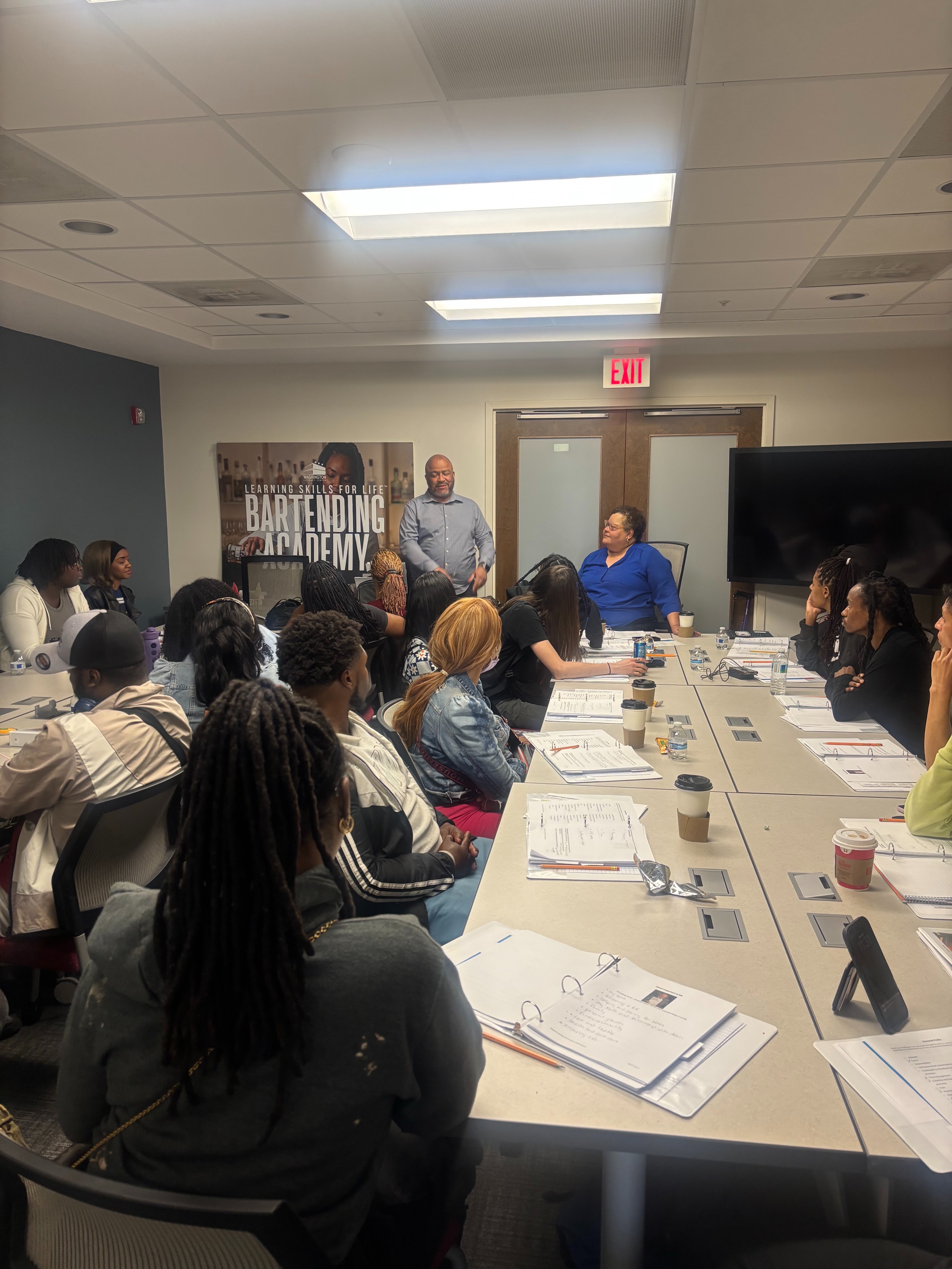 Learning Skills for Life graduate Shane Johnson spoke to our latest cohort on their first day of the program yesterday. Shane is the Deputy Director of Financial Analytics, Health Policy & Valuation Strategy at TD&P Consulting. He enrolled in our LSFL program to realize his dream of being a mixologist and now works at private events around the city in his free time. Shane gave an inspiring message to the students to make their dreams happen and what to expect from the program. @diageo_na @professionalbartendingschool #AdultLiteracy #WashLit #GetLit #AllWalksOfLife