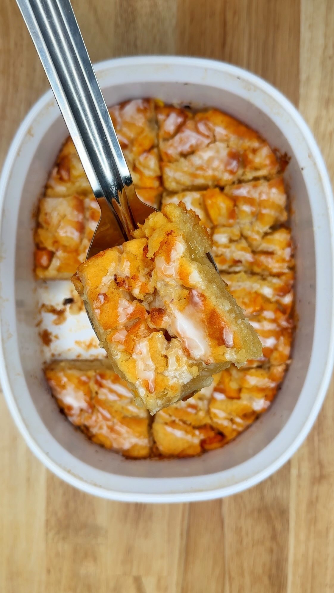 Peach Cobbler Meets Butter Swim Biscuits 🍑🧈
These buttery peach swim biscuits are the perfect combination of fluffy biscuits and sweet summer peaches. Baked right in melted butter, every bite is golden, tender, and packed with peach flavor. If you love peach cobbler and homemade biscuits, this easy recipe is about to become your new favorite!
Ingredients
1/2 cup butter, melted
2 1/2 cups all purpose flour
2 cups non dairy milk (soy, almond or oat)
2 tbsps apple cider vinegar
1/3 cup sugar
1 tbsp baking powder
Pinch of salt
1 14.5oz can of peaches, roughly chopped
Icing (mix 1 cup powdered sugar with 2-3 tbsps milk)
Directions
Preheat oven to 450
In a small bowl add you milk and apple cider vinegar
Mix well and set aside to thicken, roughly 5 mins
Spray a 8x8 or 9x9 baking dish with a little oil to coat sides
Pour melted butter in
In a large bowl add your flour, sugar, salt and baking powder
Mix well
Add in your milk, start with 1 1/2 cups
Mix well to form sticky dough adding in more milk if too thick
Fold in your peaches
Pour into melted butter
Gently spread dough into pan, allow butter to coat tops
Use a knife and gently cut roughly 9 squares to help create biscuit shapes
Bake in preheated oven for 25-30 minutes
Ready when toothpick comes out clean
Remove and let cool slightly
Mix your powdered sugar and milk
Pour icing on top while still warm
Cut out squares
Serve and enjoy!
