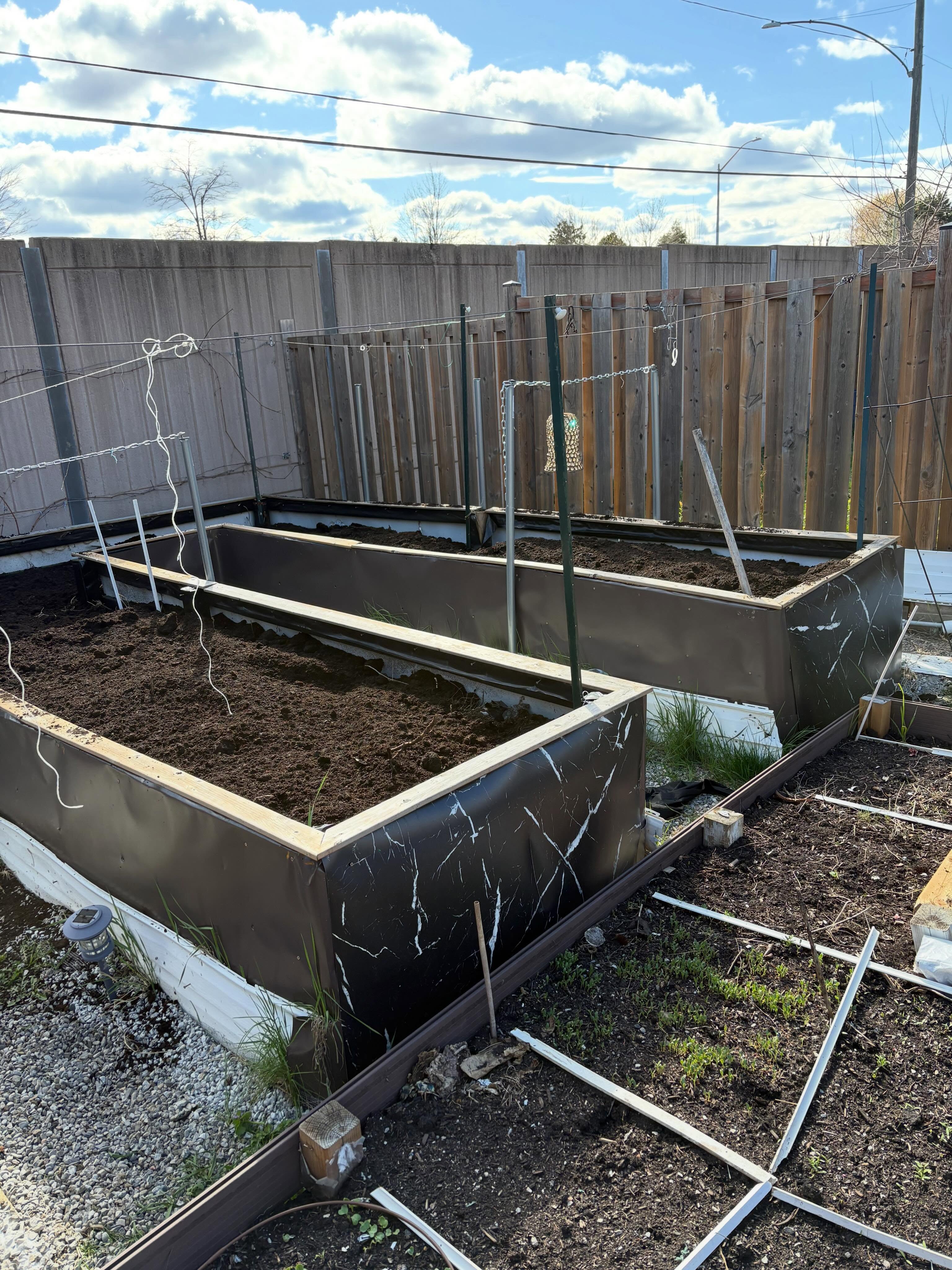 We delivered and spread 2 x cubic yards of cow manure into these raised garden beds for our customer in Brampton.