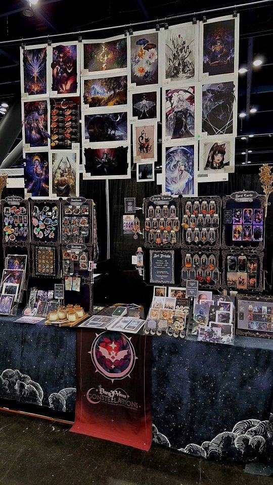 How my artist alley booth changed in 3 years! NO AURA TO AURA ✨️✌️
《 From Comicpalooza '23 to the same con in '26 》 ♡
From super spread out to condensed and organized, my setup time went from 2.5 hrs to 45 minutes!
And of course Ive increased my inventory but learned what to prioritize on the display and what to keep on hand if the people wanted more. Having a fold out print display and a portfolio album helped condense setup time and visual mess~
I know you dont see too much handmade stuff in the updated booth setup! I still make bows, jewelry and keychains; they just get sold faster than I can restock, haha!
Thank you to all my shop patrons who have been returning to see me since day one! Yall give me the spirits to renew myself year over year ♡
#artistalley #artistshop #fantasyartist #handmadeartist #witchyart