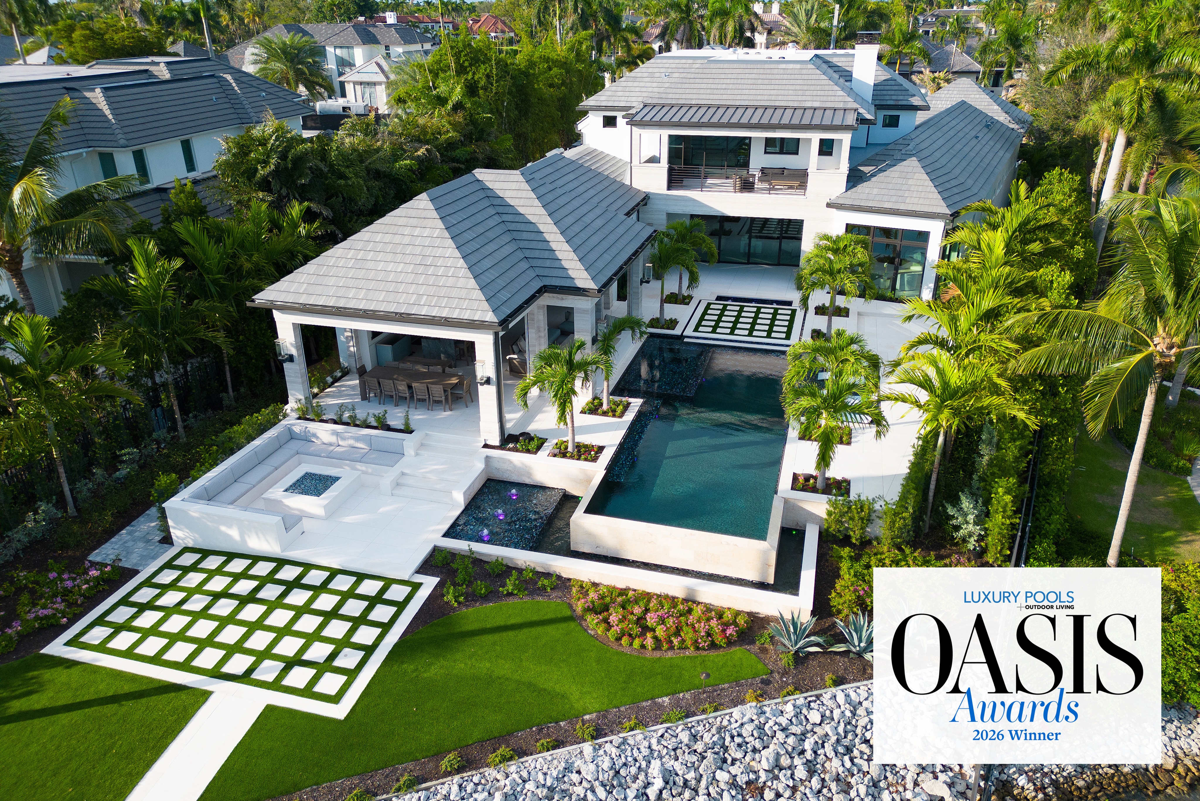 Winner of a 2026 Oasis Award from Luxury Pools + Outdoor Living Magazine, Palm Mosaic Retreat is a masterclass in modern waterfront living.
Defined by bold geometry, seamless indoor-outdoor connections, and a striking vanishing-edge pool, the design creates a visual rhythm that draws the eye from the home to the water’s edge. Every detail was carefully orchestrated to deliver an experience that feels both sophisticated and effortless, balancing architectural precision with the lush beauty of the tropical landscape.
Palm Mosaic Retreat represents the highest level of outdoor design excellence, transforming the property into a private resort where luxury is experienced not as an amenity, but as a way of life.
Architect @kukkarchitecture
Builder @bcbhomes
Photography @dianatodorovaphotography
#OasisAwards #LuxuryPoolsMagazine #AwardWinningDesign #WaterfrontLiving #OPIDesign