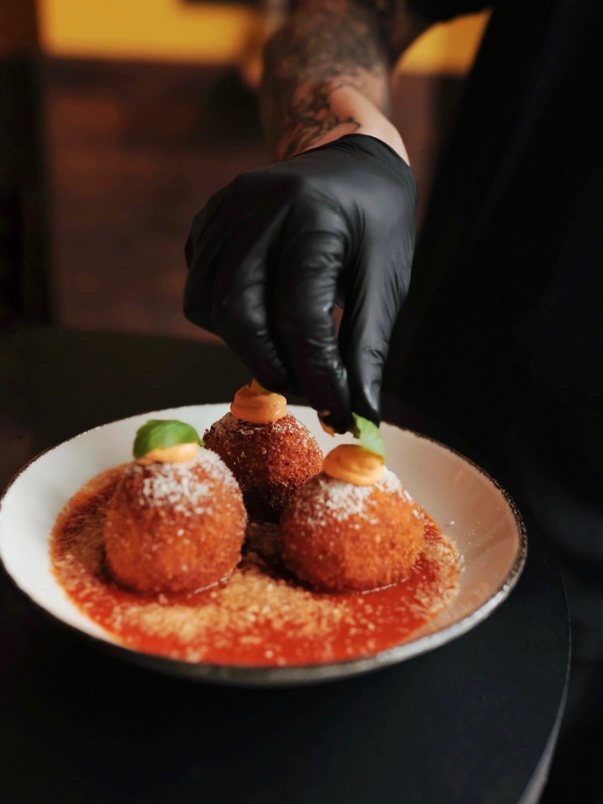 Arancini have been a Sicilian favorite for centuries and ours are made with a little Pacific Northwest twist.
We make the risotto with the whey left from hand-stretching our mozzarella, then fold in Fontina from Ferndale Farmstead, Farmwild basil, and Bianco Di Napoli tomatoes for our beautiful sauce.
📸 @kristinkins
A simple dish rooted in tradition, made with ingredients we love.