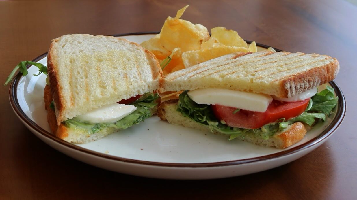 Introducing our June special! The Caprese Sandwich.
Grilled panini bread layered with basil mayo, fresh mozzarella, arugula, and beefsteak tomatoes, salt and pepper — finished with a balsamic drizzle. Simple ingredients with a bold flavor!
Come on in and try it!
#CarrollsKitchen #JuneSpecial #FreshFood