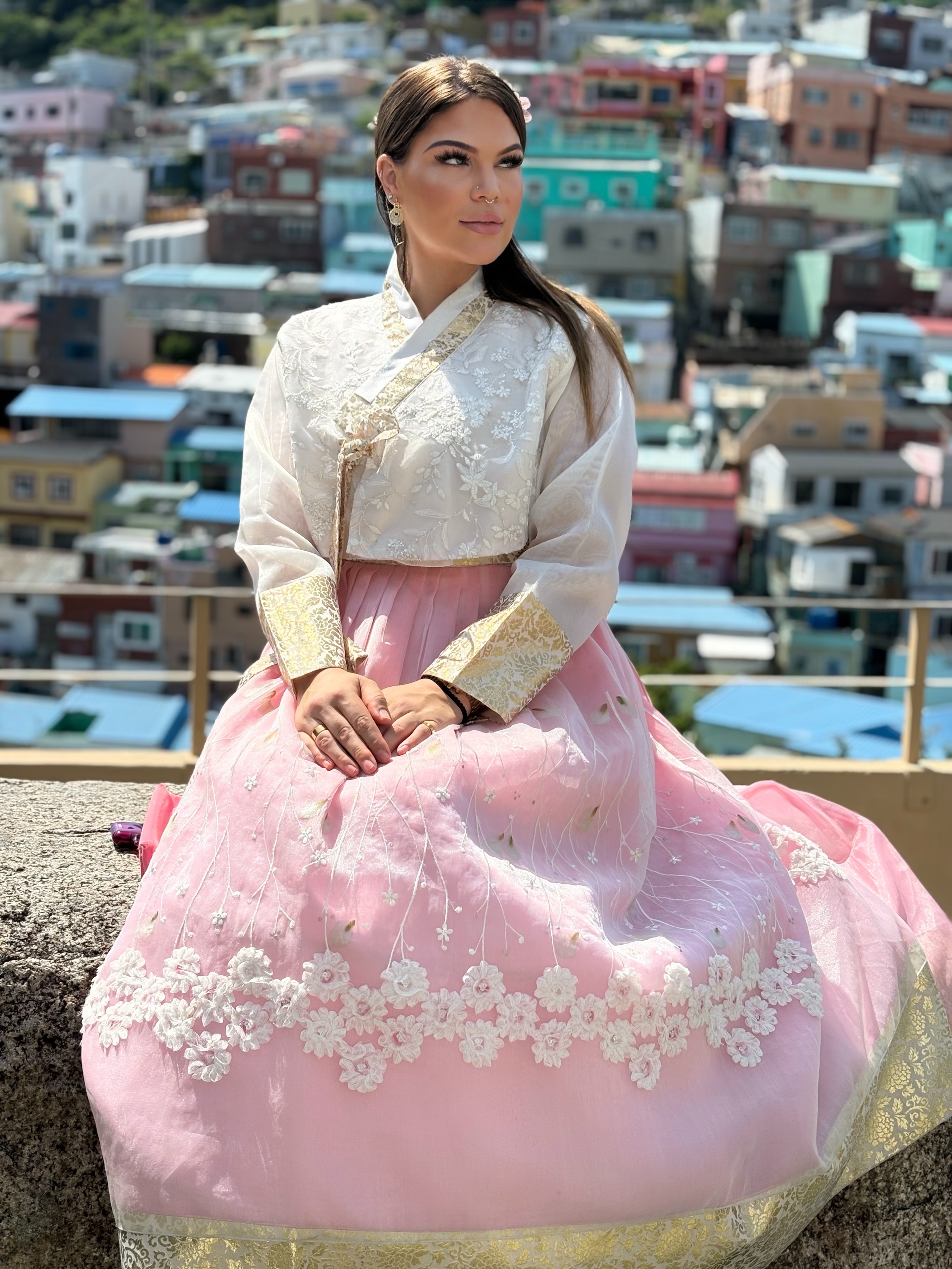 To travel is to briefly become a part of a story that began long before you arrived.
Today, dressed in the traditions of another generation, I wandered through Busan with a sense of wonder and gratitude. Not because I was pretending to belong, but because I was invited to learn.
The further I travel, the more I realize how beautiful it is that the world is filled with people whose histories, customs, and traditions are different from my own—and how much there is to gain from simply being curious enough to listen.
A memory I’ll carry long after the photos are forgotten. 🇰🇷📍🫰🏼
#traveldiaries #busan #southkorea #culturalwear