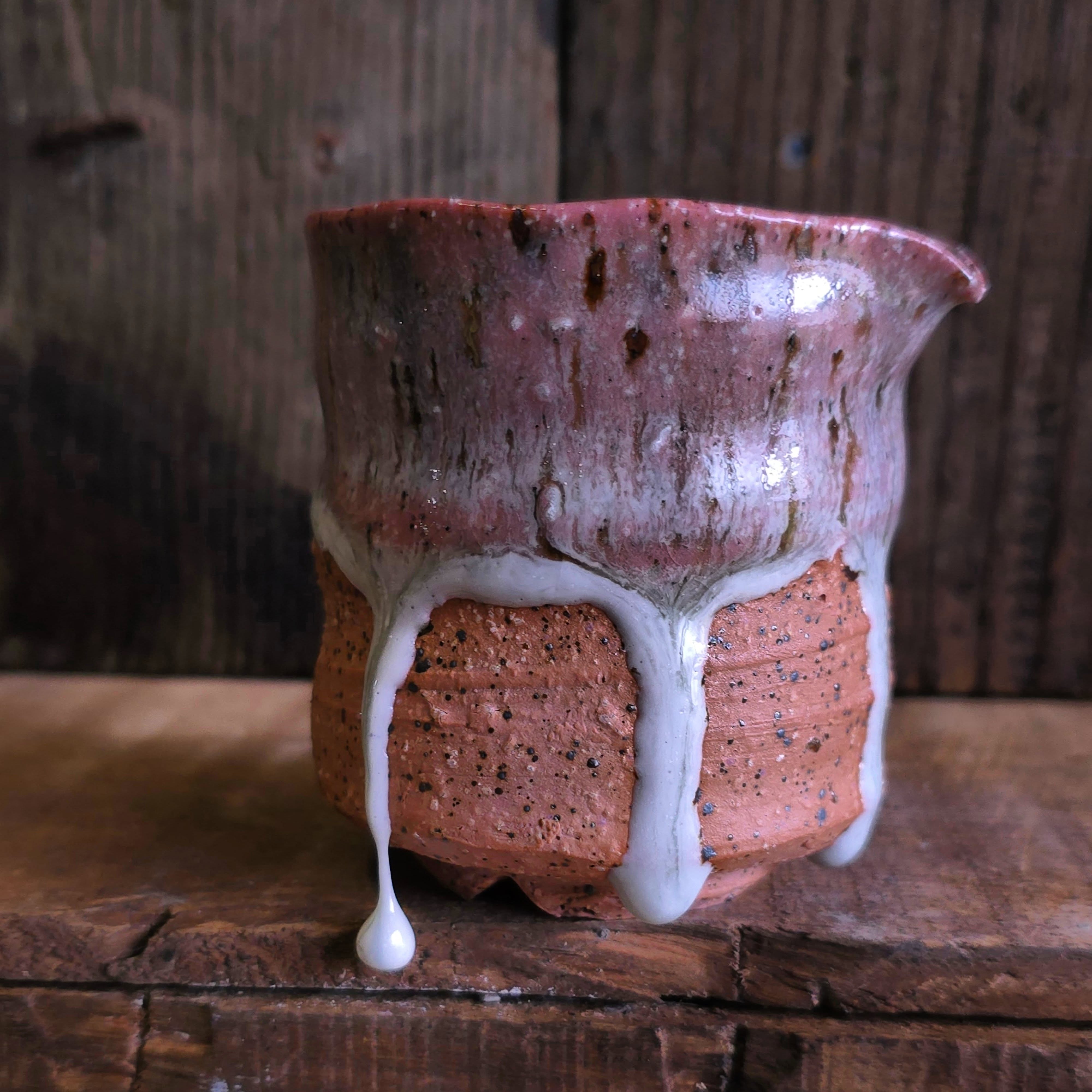 Sometimes you get these little treasures in the kiln. I can control much of the process but not all of it, the nature of having a drippy glaze like this makes it so that the results are always a little different. It's always a surprise opening the kiln and fun little gems like these make it that much more exciting. Even though I can't leave a drip like this on the pot, I still love when it happens.