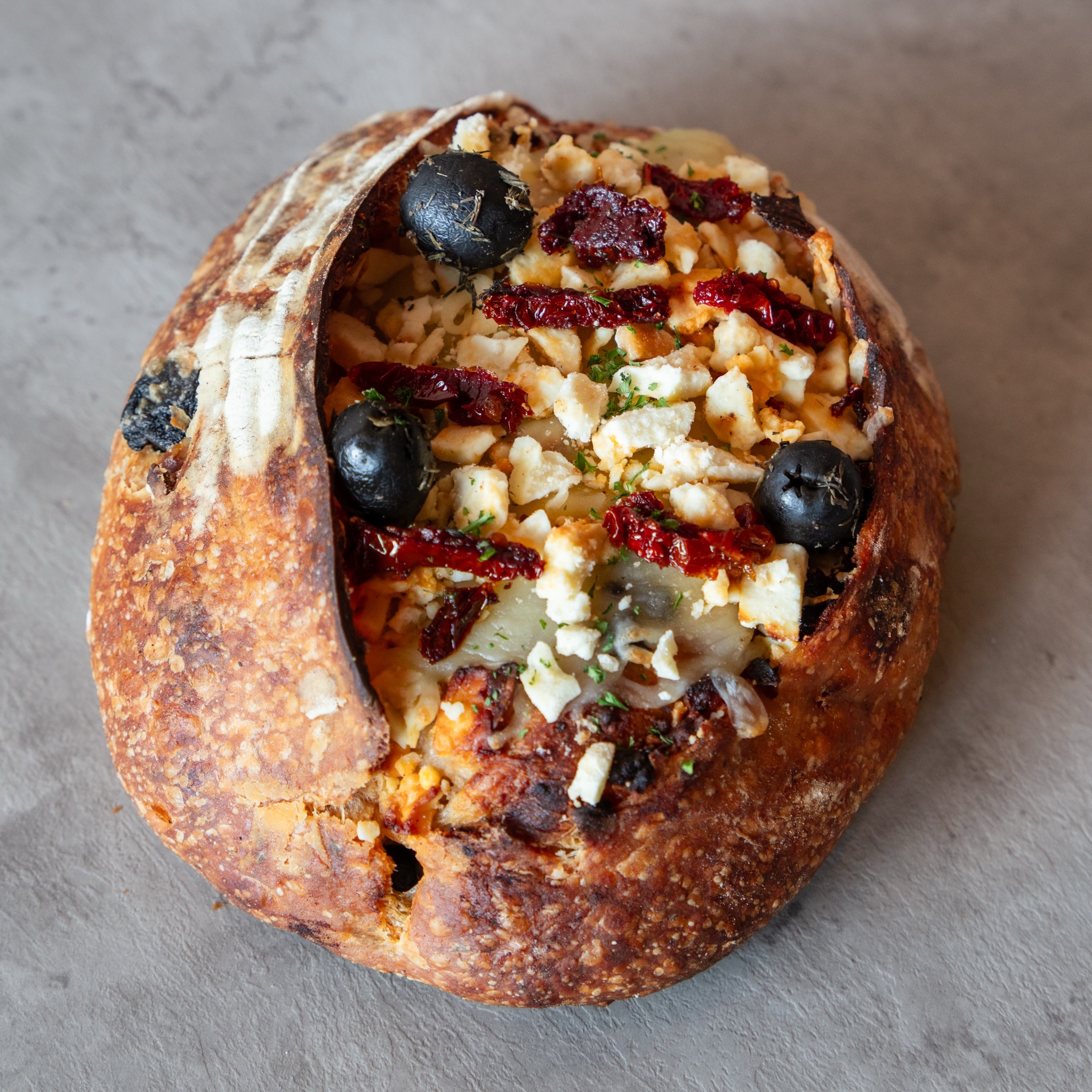 Feta, olives, sun dried tomatoes, mozzarella, all baked into our sourdough. ❤️ Our Mediterranean Loaf is here for June and it’s the kind of bread that doesn’t need anything else on the side.