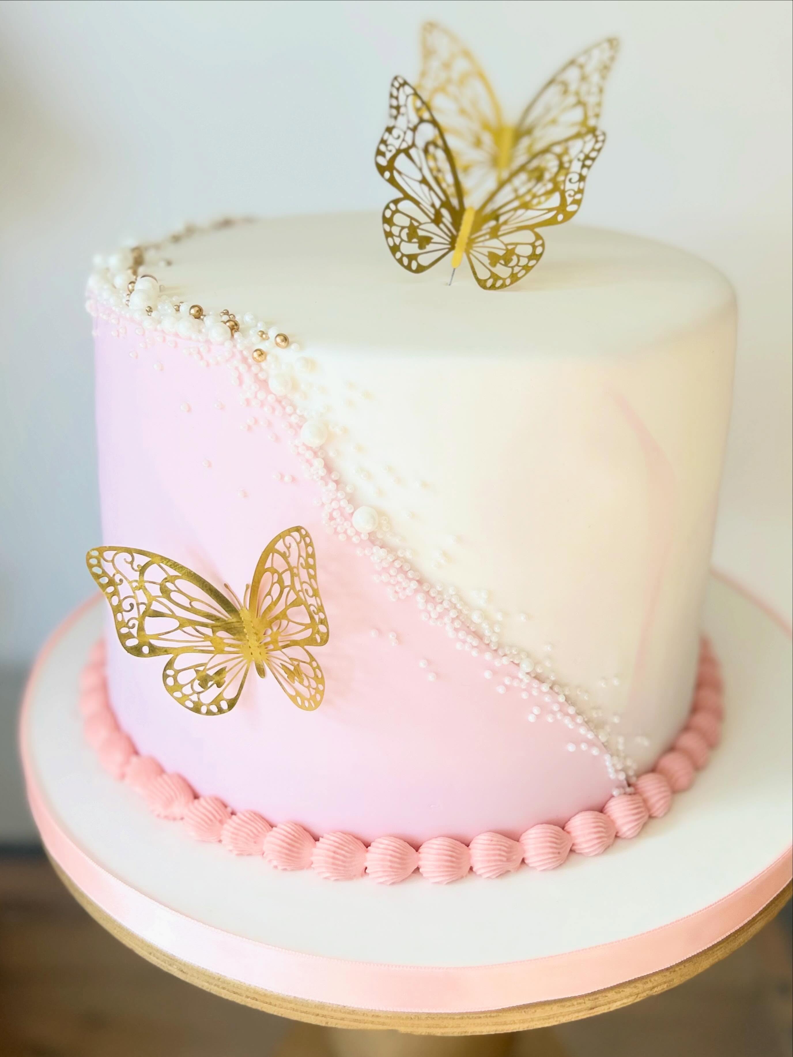 Pretty in pink and made completely eggless!
Delicate butterflies, pearl details, and soft blush tones come together to create a cake that’s almost too pretty to cut... but too delicious not to!
#EgglessCake #ButterflyCake #PinkCake #BirthdayCake #CelebrationCake