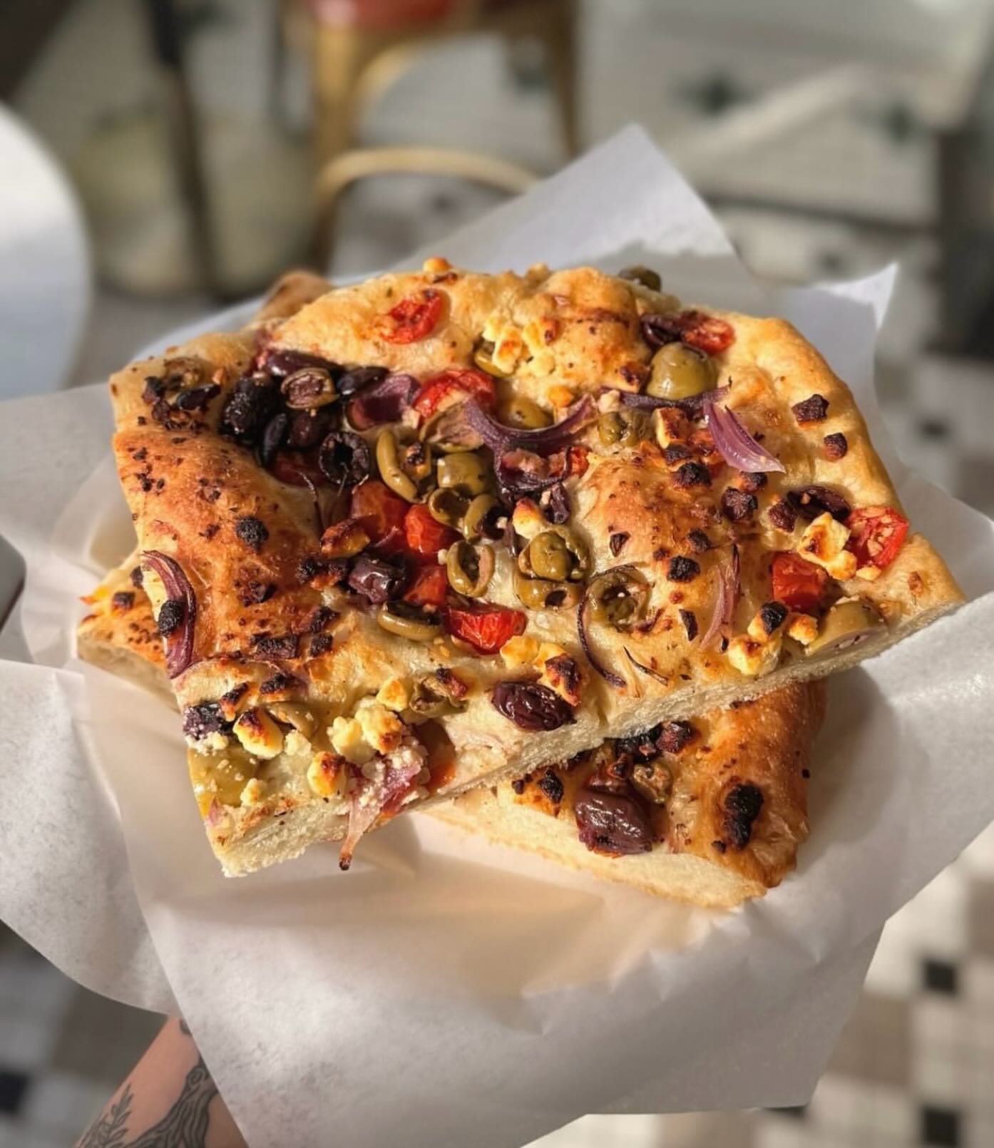 Big Fat Greek Focaccia is back in our ovens for #FocacciaFriday, and we’re just as excited about it as ever! 🫶
Built on our classic fluffy focaccia dough, this savory favorite is topped with feta cheese, green and black olives, red onion, and tomato for a combination that’s fresh, flavorful, and hard to resist. 🫒
Big Fat Greek Focaccia is an easy weekend favorite. It’s hard to go wrong with something that tastes this good! 🥖
#yourlocalbakery #breadrecipe #mackenziesbakery #bakedfreshdaily