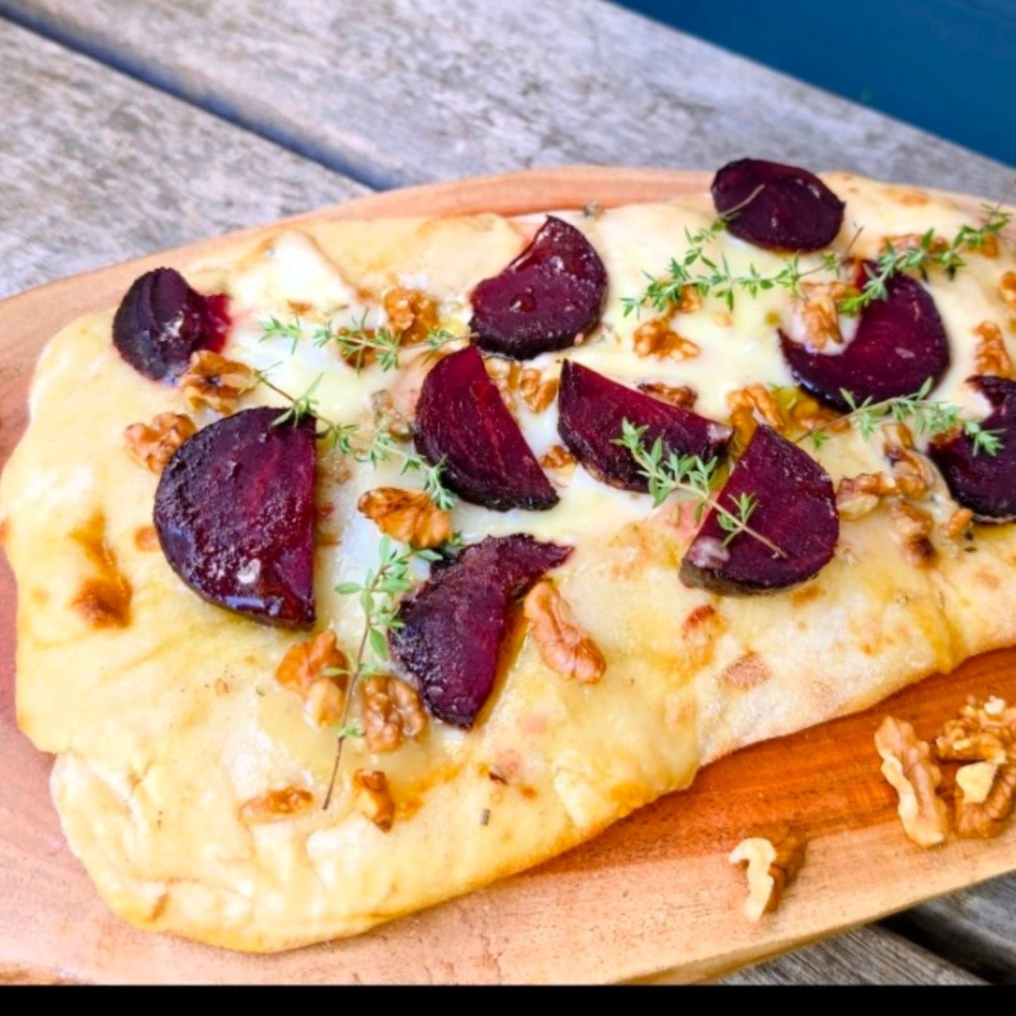 Still a work in progress, but I wanted to share
one of the pizzas I've been developing for Wanda, our Wandering Kitchen ...
Sweet earthy Roasted Beetroot , fabulous local Granulated Honey, Walnuts for a little warmth and crunch, along with a little scattering of Herbaceousness ... And then there's the all important cheese...
Over the last few weeks I've been tasting my way through some wonderful local Somerset goat's cheeses, searching for the one that brings everything together.
The challenge? Finding a cheese that's creamy enough to complement the beetroot and honey without overpowering them.
I've tried some fantastic cheeses so far, but I haven't found the one just yet.
The good news is that the search continues (which is a pretty good excuse to eat more cheese!!!). When I finally find the perfect Somerset cheese, I'll et you know, but until then, I'll just keep testing that cheese, such a struggle, think of me won't you? 😂
Until then, what do you think? Should The this pizza stay true to goat's cheese, or would you be tempted by a different local Somerset cheese?
#Somersetfood #supportlocal #cheese #wanda #FoodWithAStory