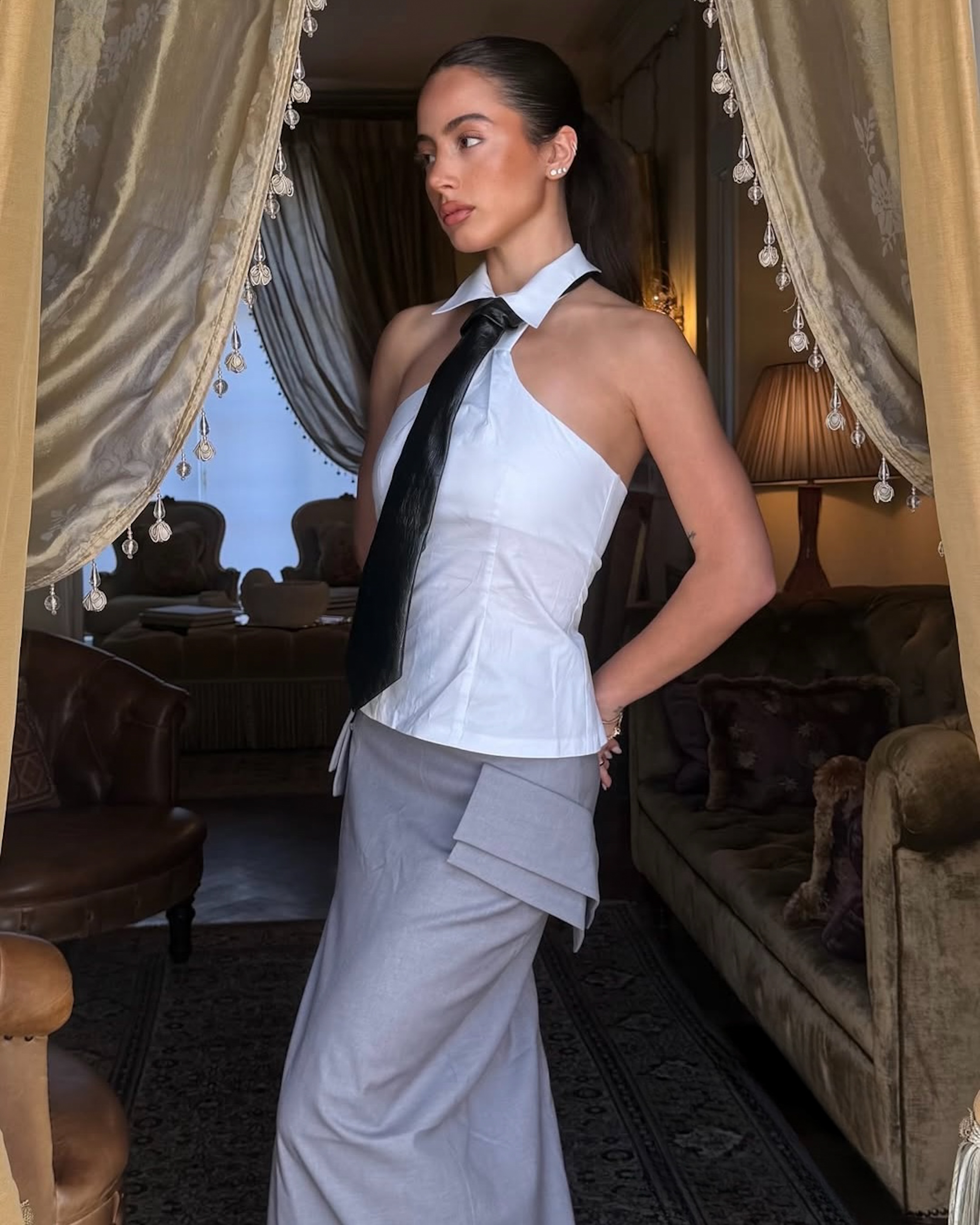 Power chic by @lissywynn ⚡
.
Shop EXECUTIVE Skirt, TIE Top, and CROC Tie at www.darann.com