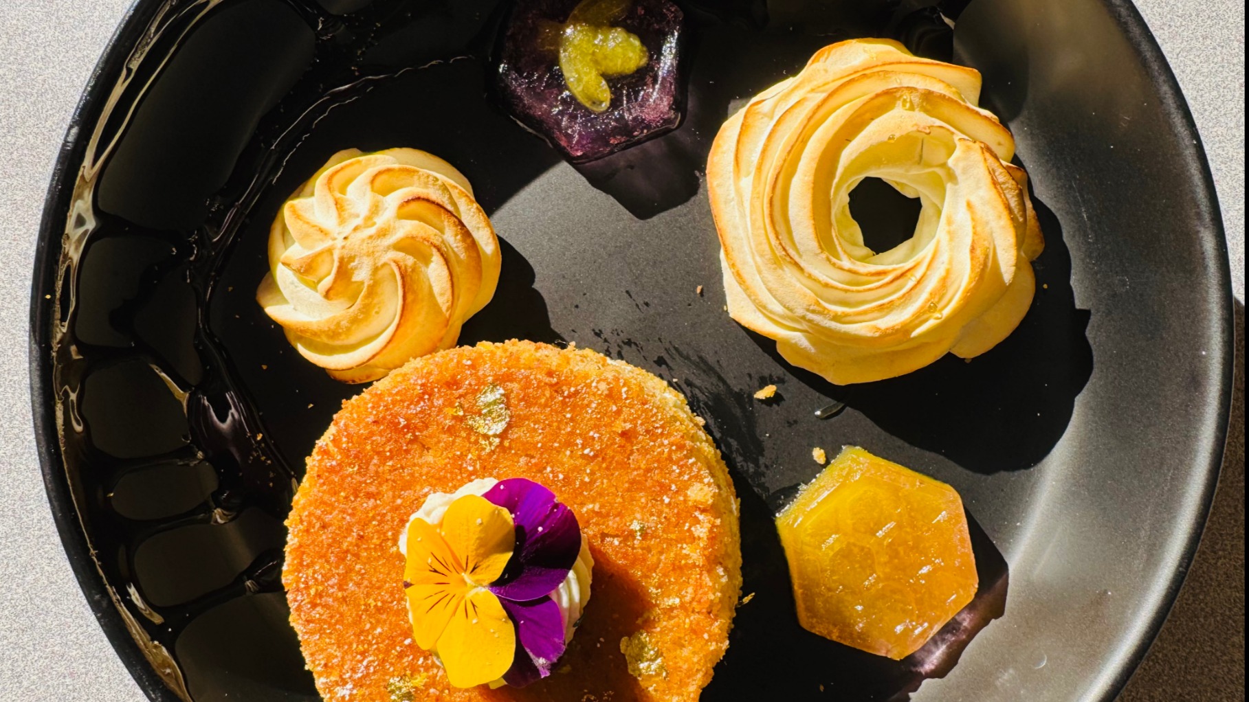a dessert plate from my first year of culinary school that I'm still quite proud of. It was a honey almond cake with a lemon time meringue and honey lavender jellies