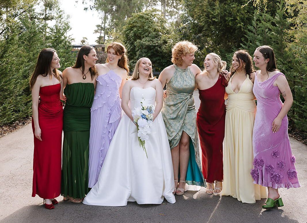 🩷🧡 Bernie's Gals 💛💜
On Bernie & Finn's wedding day, I couldn't help but notice the girls in the audience brimming with pride and overflowing with happy tears as they listened to all the ways Finn loves Bernie so dearly.
Bernie's brightly-dressed besties were her hype crew, her unofficial bridesmaids, her confetti passer-out-terers, her family photos wranglers, and they well and truly slayed that dance floor from start to finish.
Beautifully snapped by @hannahbriggs.weddings at @barn.and.co Balnarring.
#weddingdayhypecrew #weddingsdonedifferently #melbournemarriagecelebrant