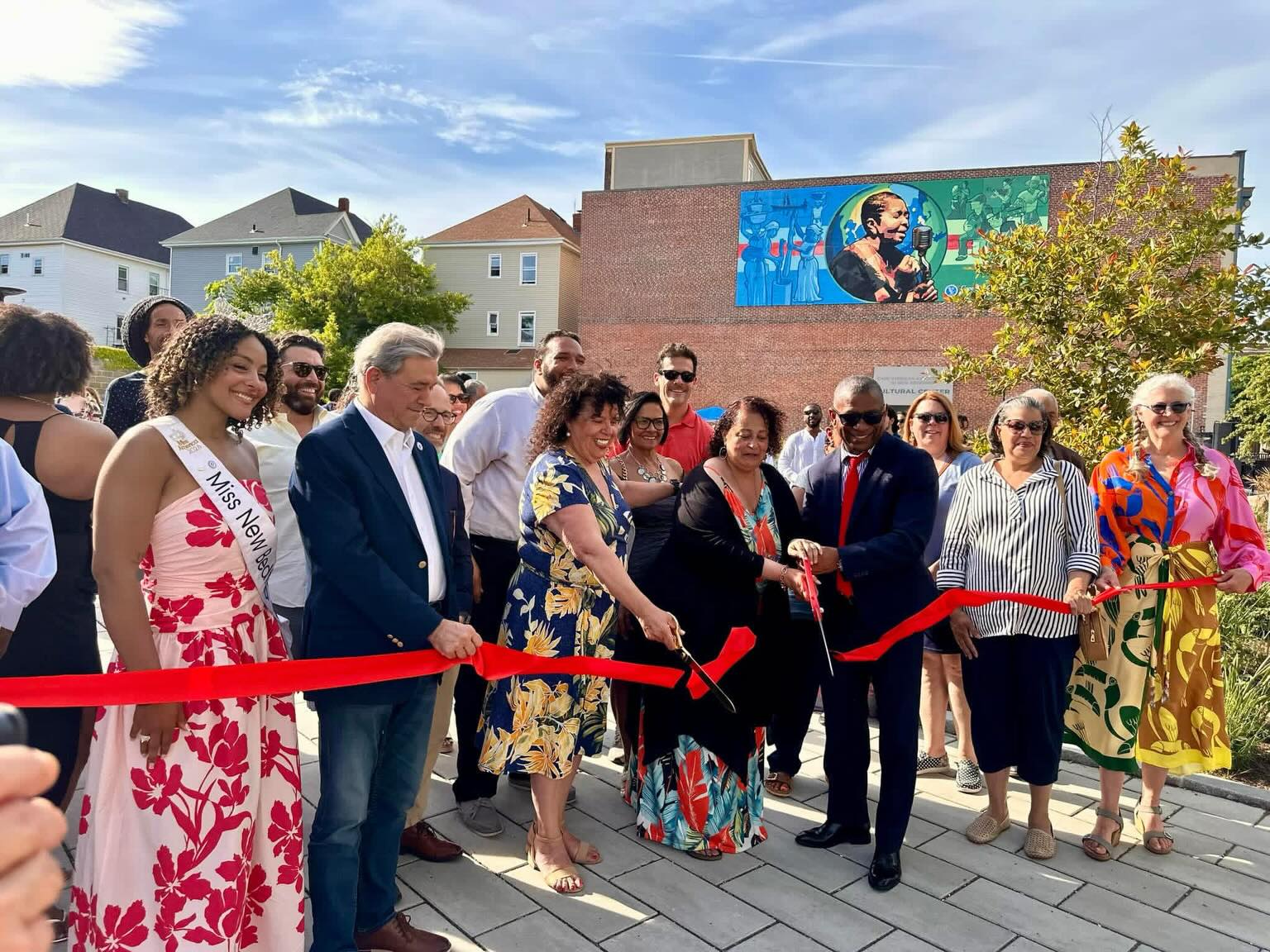 Friday, I had the opportunity to attend the ribbon cutting of Island Park on Acushnet Ave., a wonderful new space dedicated to celebrating island culture, community, innovation, and sustainability. 💛
The afternoon featured performances by the New Bedford Symphony Orchestra, Cabo Verdean musicians Spencer, Vava & Tchico, and Batukada Otu Level, bringing music and energy to this exciting new gathering place. 🎶
Island Park includes public art, a tiny library, and spaces designed for community gatherings and performances. Perhaps the coolest feature is the landscape itself, which brings together plants from the South Coast, Cape Verde, the Azores, and the Caribbean. And yes—there are palm trees! 🌴
The park also incorporates a number of sustainability features, including rain gardens, a no-mow lawn, solar lighting, a seashell-covered parking lot, and other design elements that help care for the environment. ♻️🌱
Congratulations to the @cva_nb on this incredible achievement, more than seven years in the making. Thank you to the many partners, funders, artists, city departments, volunteers, and community members whose hard work helped make Island Park a reality. 👏
Be sure to check out the Summer in the Park Series, which continues throughout the summer with music, culture, and community celebrations. ☀️🎶