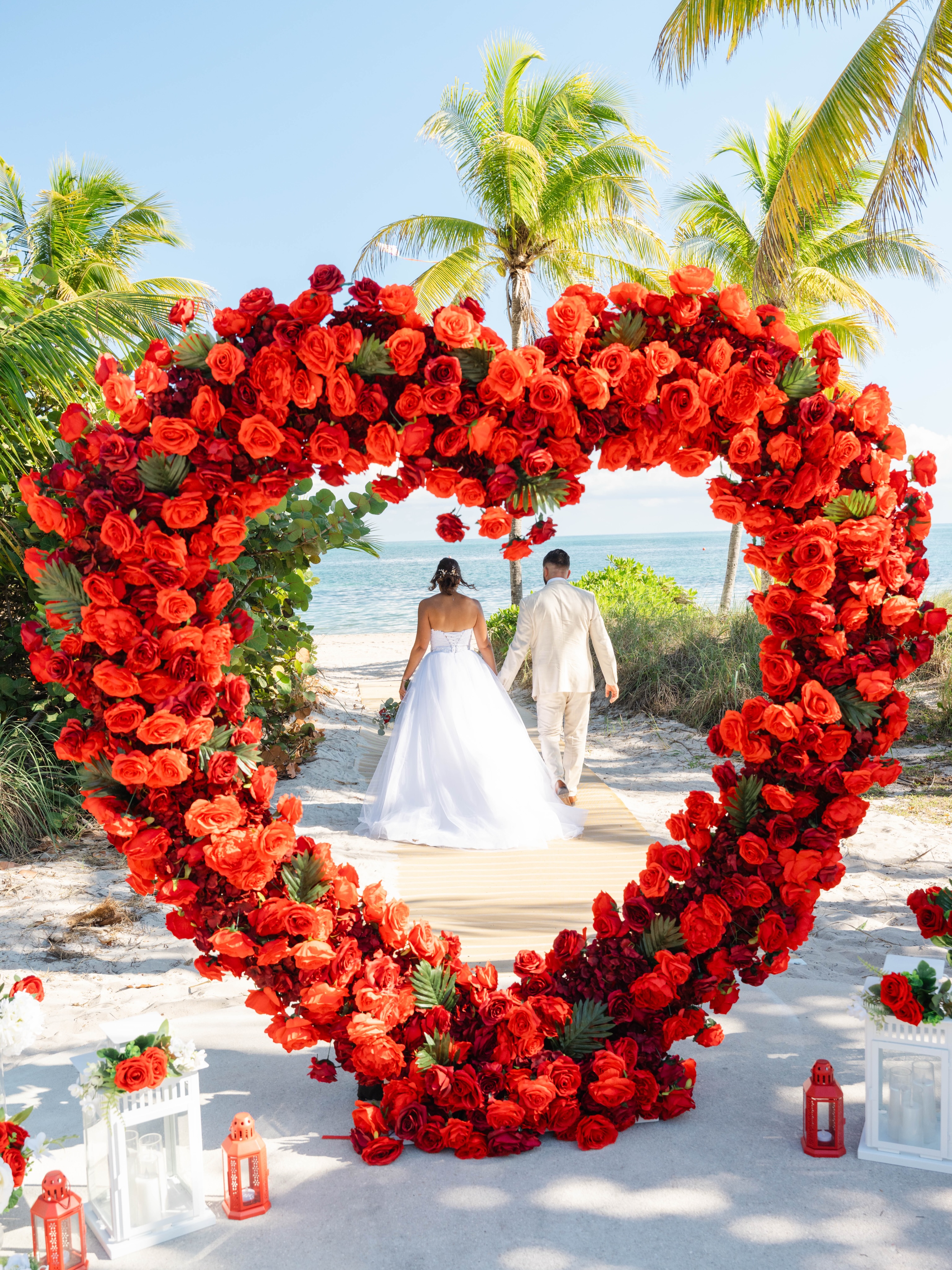 Say “I do” with the ocean as your witness.
Imagine exchanging vows beneath a stunning heart-shaped floral arch, surrounded by swaying palm trees, soft white sand, and breathtaking ocean views. This romantic beach wedding setup is designed for couples who want an unforgettable destination wedding filled with elegance, passion, and timeless beauty.
From luxury wedding décor and floral installations to intimate beachfront ceremonies and picture-perfect moments, every detail is carefully curated to create a celebration that feels uniquely yours.
Whether you’re planning a destination wedding in Florida, a tropical beach ceremony, an elopement, or a luxury seaside wedding, our team transforms your vision into an extraordinary experience.
Ready to create the beach wedding of your dreams? Send us a message and let’s start planning your perfect day by the ocean.
📍 Beach Wedding Design & Décor
💍 Destination Wedding Planning
🌴 Luxury Oceanfront Ceremonies
🌹 Romantic Floral Installations
📸 Instagram-Worthy Wedding Experiences
Limited dates available for upcoming wedding seasons.